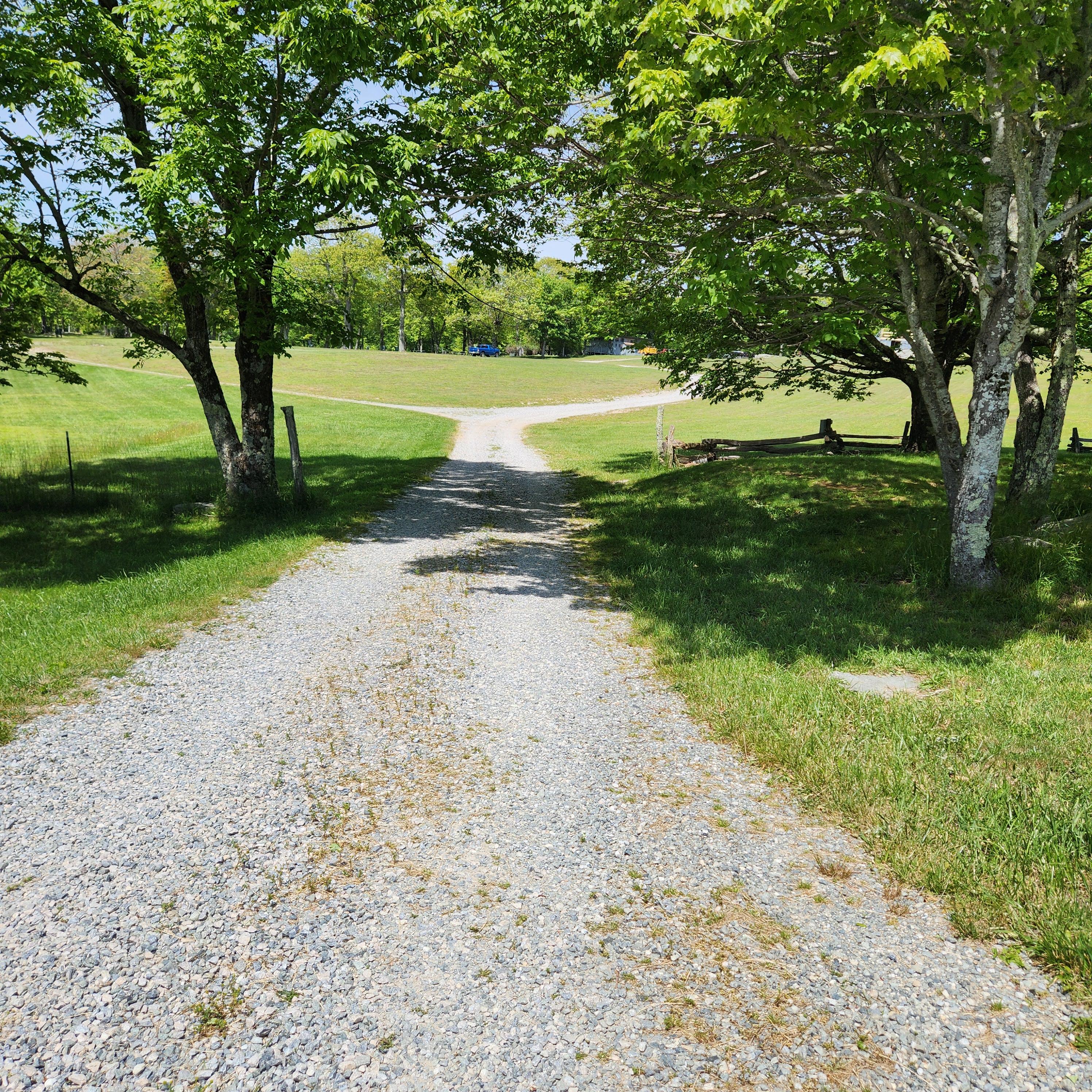 After the reception, you’ll head down this path back to your vehicle. The entire grassy area just past the fence is the parking area. Some cars will be parked pretty close to the fence.
