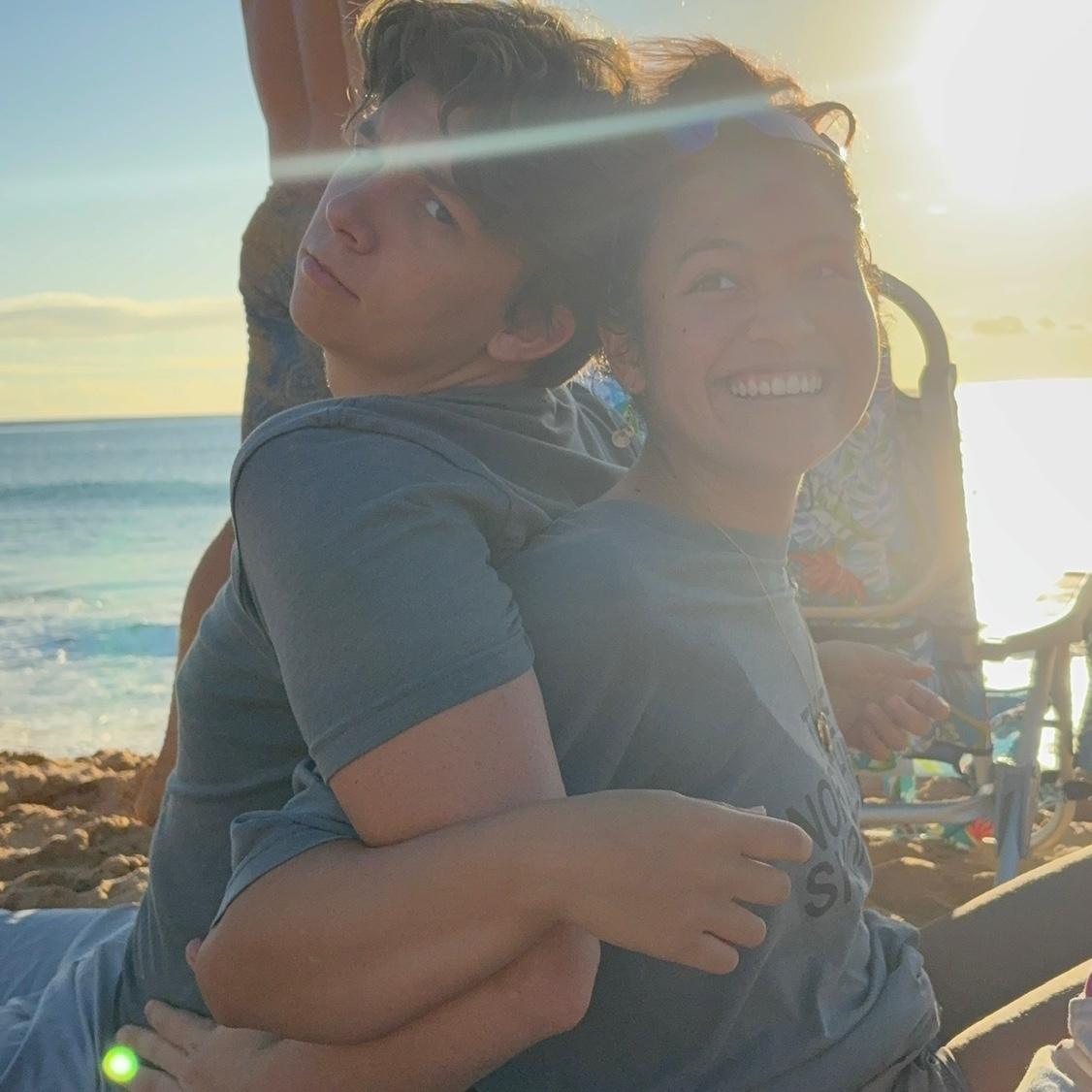 Last sunset of 2025 spent together at the beach with family and friends