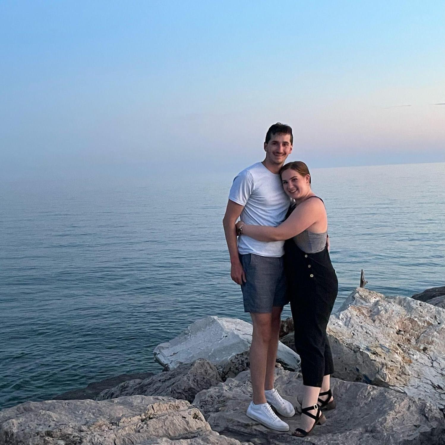 Meet me in Muskegon! Despite Matt's distaste for Michigan, these two love a good sunset on the lake (and posing for the camera).