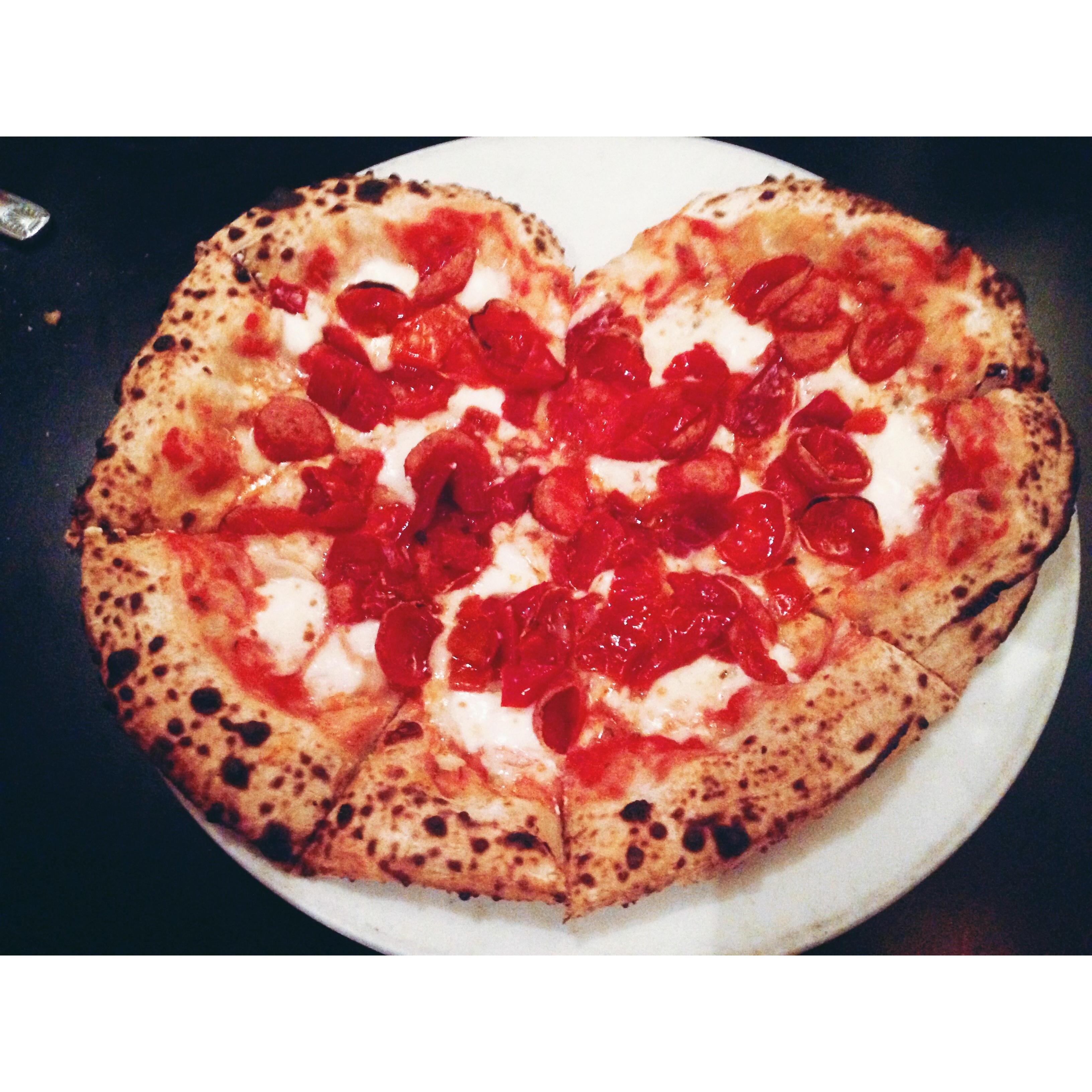 Bruno's Pizzaria - They brought our pizza in the shape of a heart! They must have known we were so in love!
