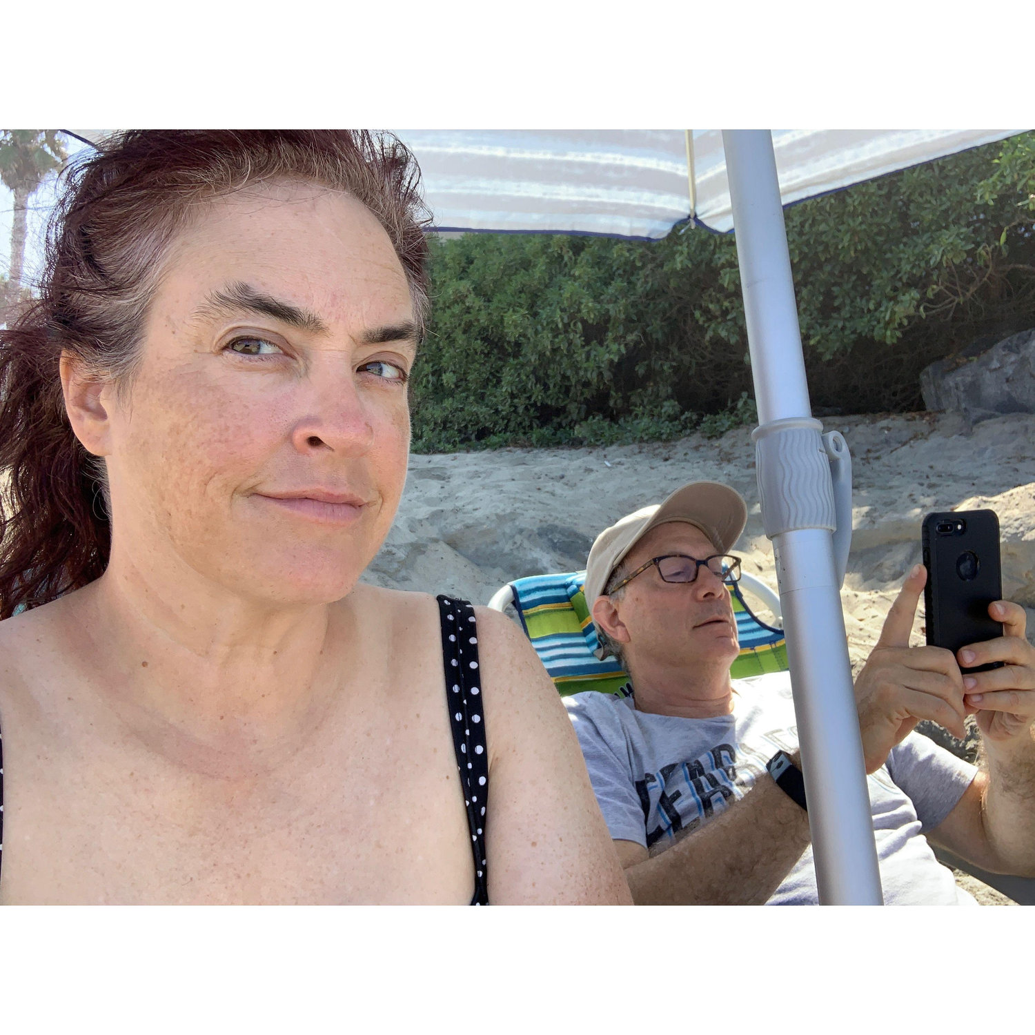 Our first and only trip to the beach together. Here he was logging his meals.