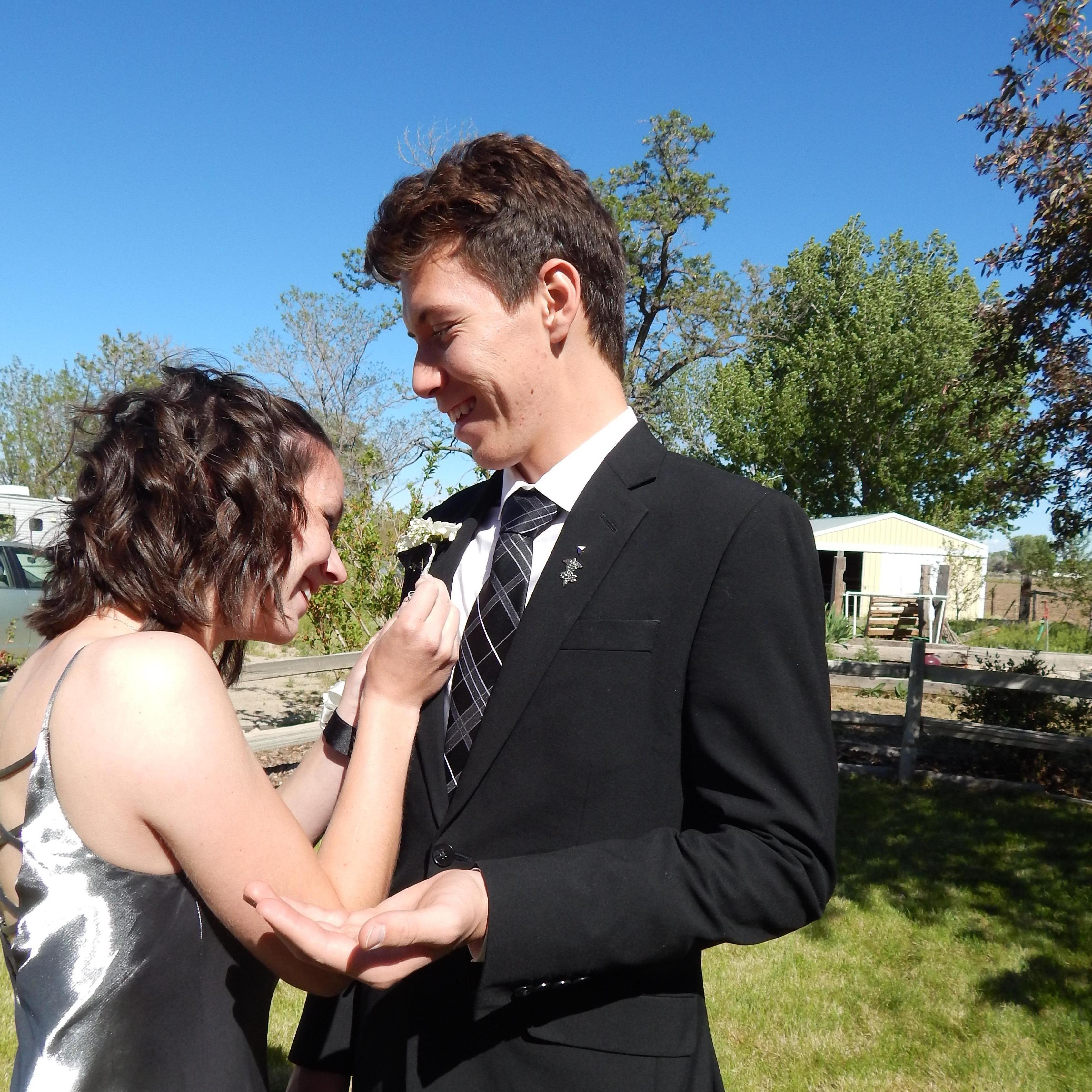 Adam was very nervous when Rebecca tried to put his boutoniere on, even though she was ~very~ confident.