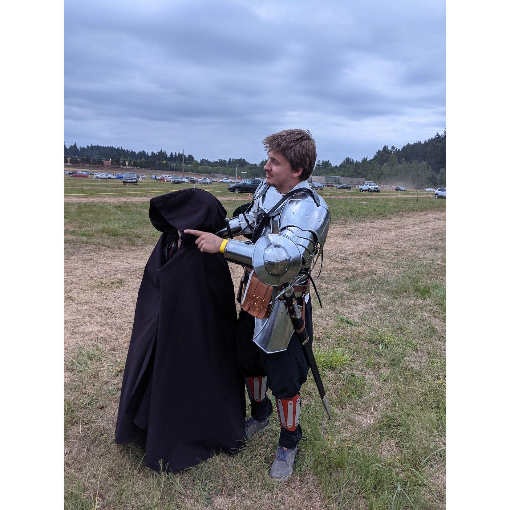 Sir Cole and a 'mysterious' hooded figure....