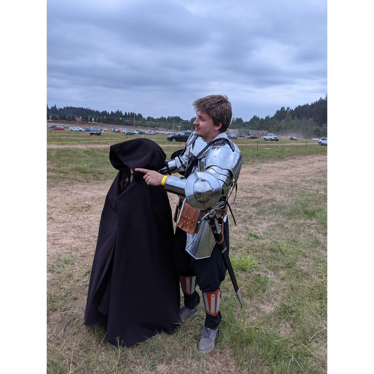Sir Cole and a 'mysterious' hooded figure....
