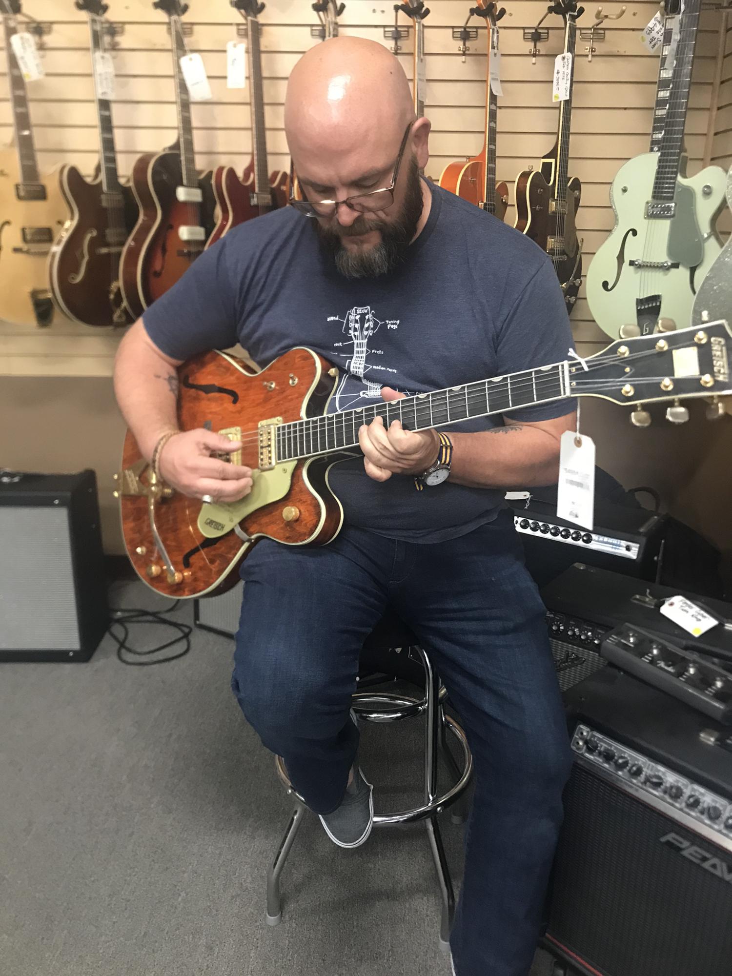 Ed enjoying Country Gentleman in Norman's Rare Guitars in Tarzana, CA