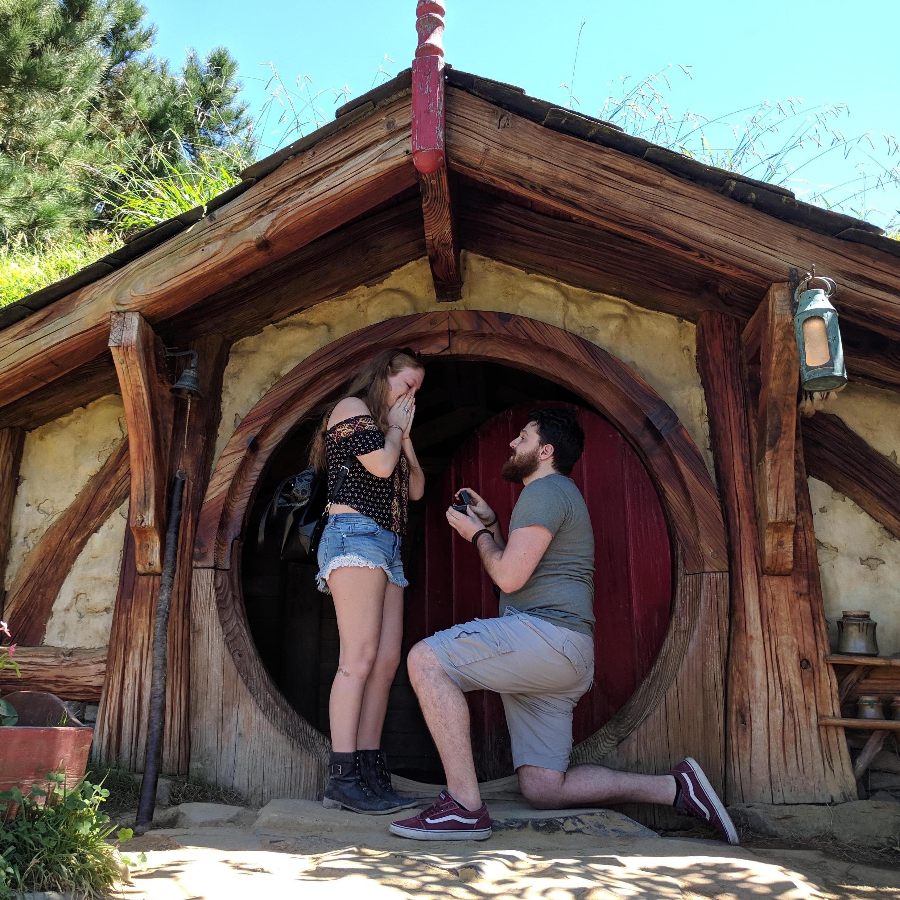 The Proposal in front of a Hobbit House