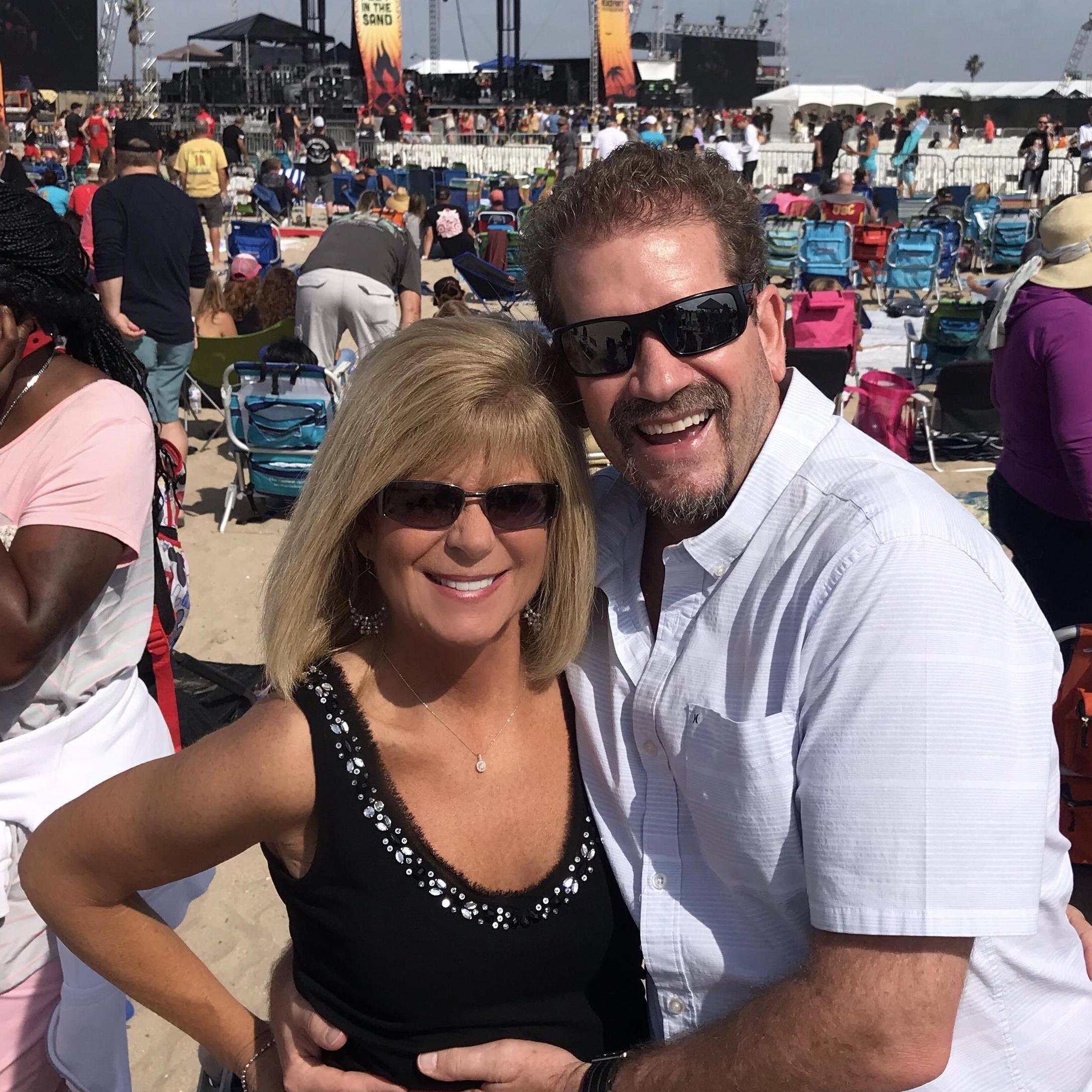 Toes in the sand, drink in the hand...Sammy Hagar at the beach in Huntington Beach California.