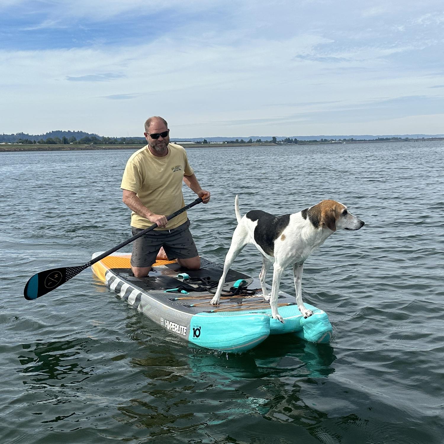 Clint and his lookout on the paddle board, September 2024.