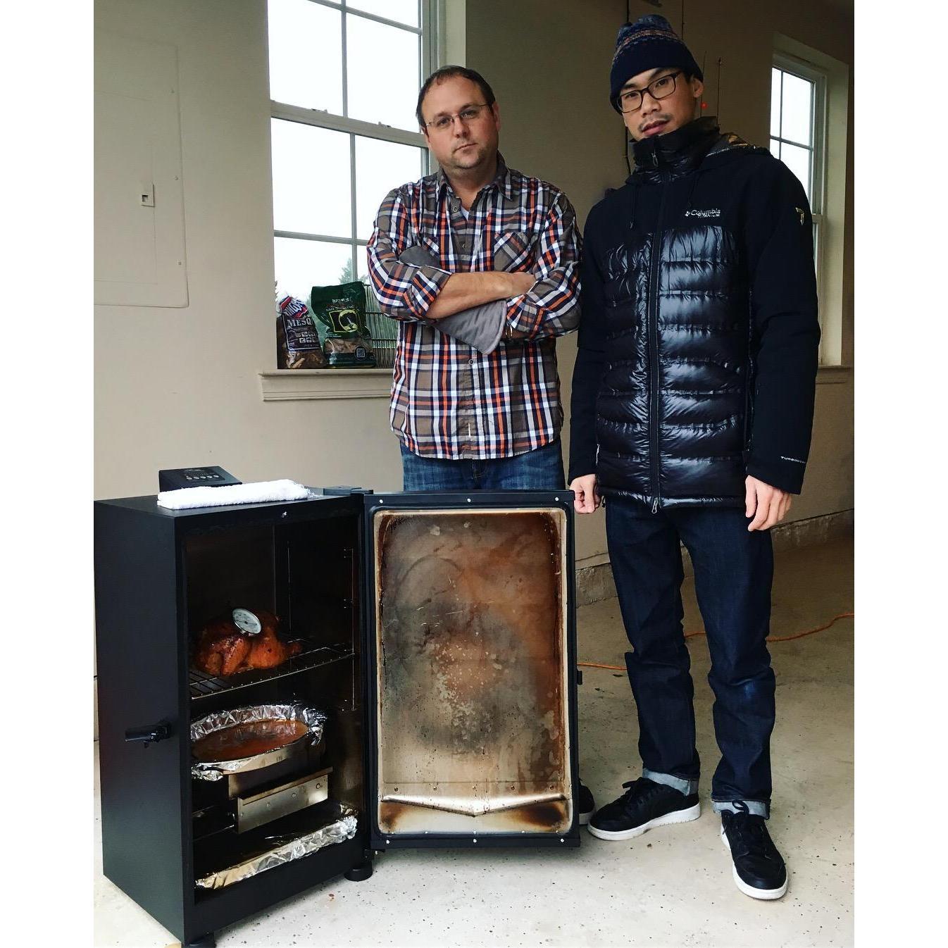 Jason and Henry smoke meat for Christmas in VA.
Mother Ervin thinks Jesus' face appeared in the smoker door. Christmas 2017.