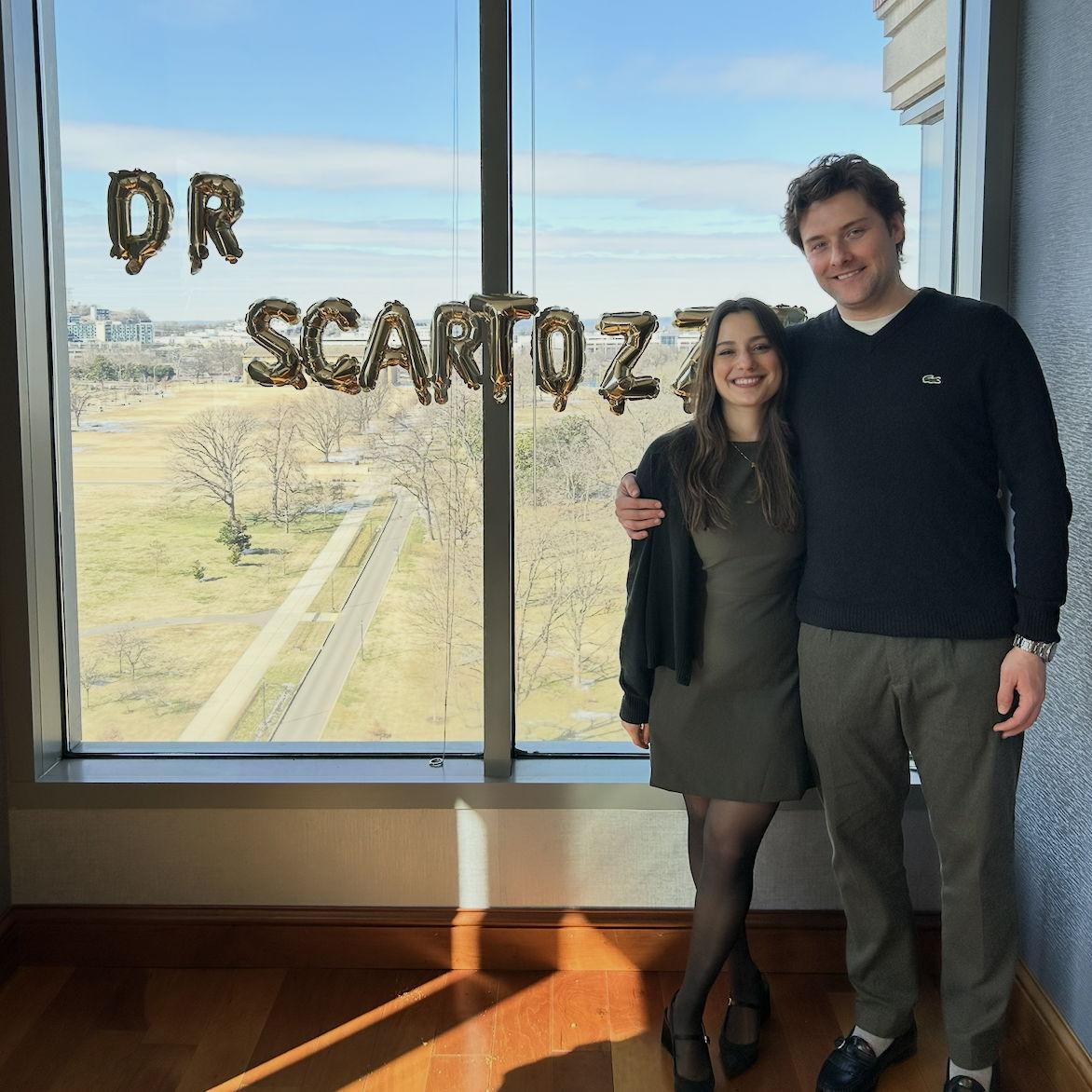 Thomas supported Alyssa when she finally defended her Ph.D. dissertation in February of 2026!