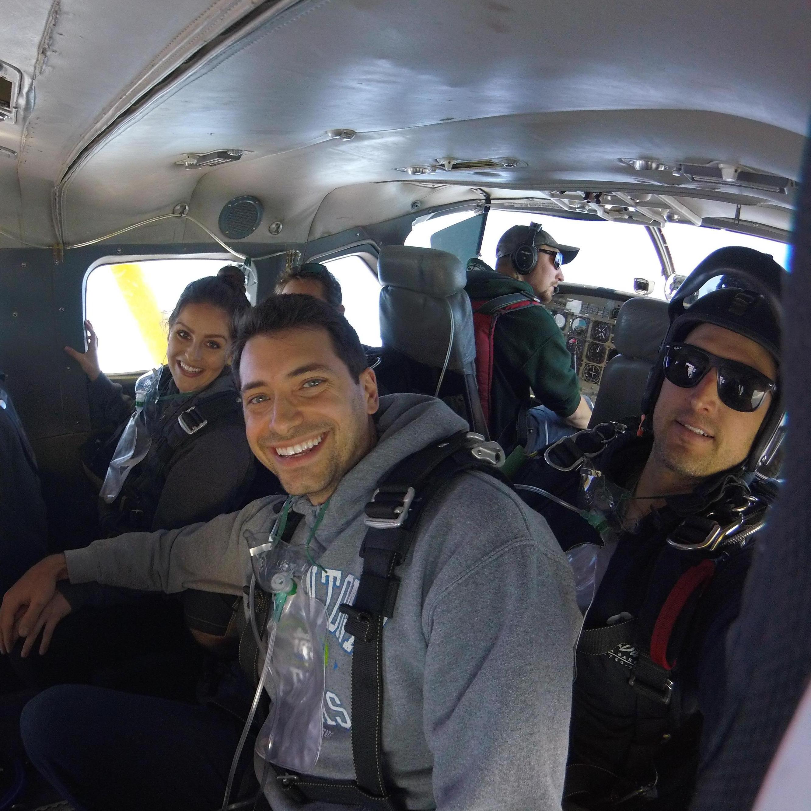 On their first date, Leigh told Jonathan that she always wanted to skydive.  Jonathan said it was on his bucket list as well.... For her first Christmas present to him, she took him skydiving..