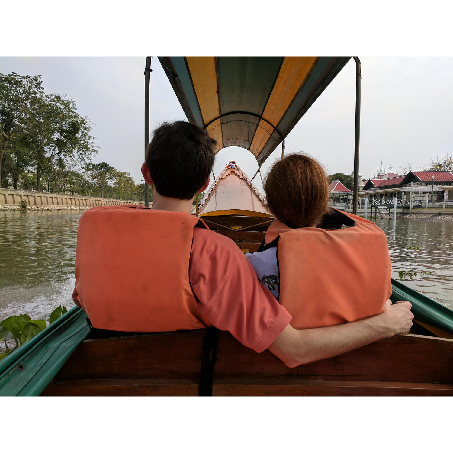 A romantic moment on a longboat trip in Thailand
