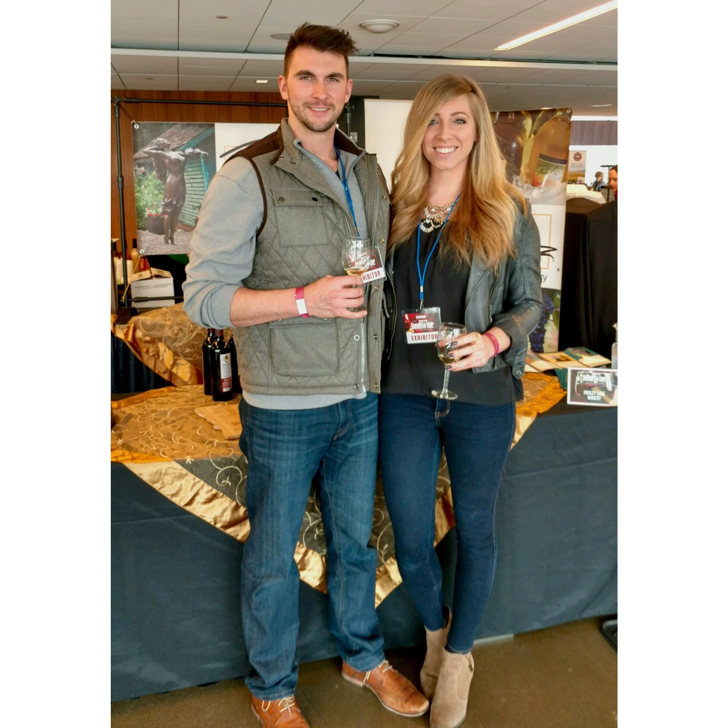 Doing what we do best - drinking wine! Taken at the Minnesota food and wine show.