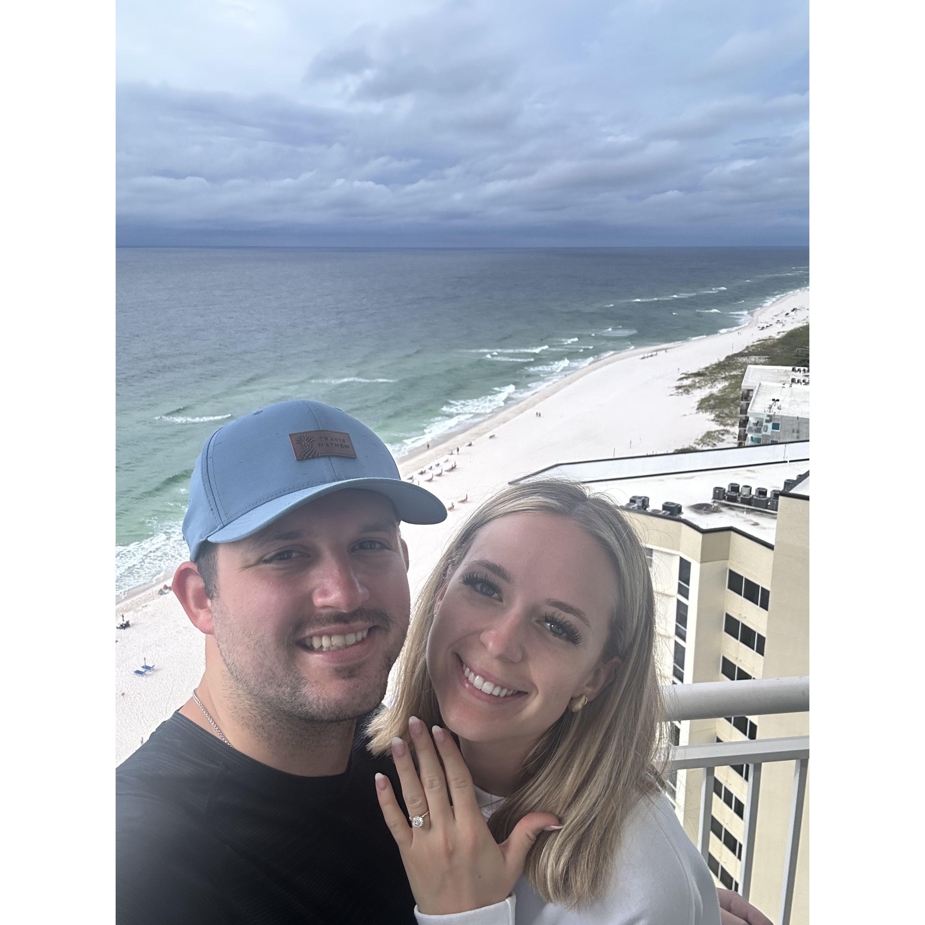 Right behind us on that sand is where he popped the question!