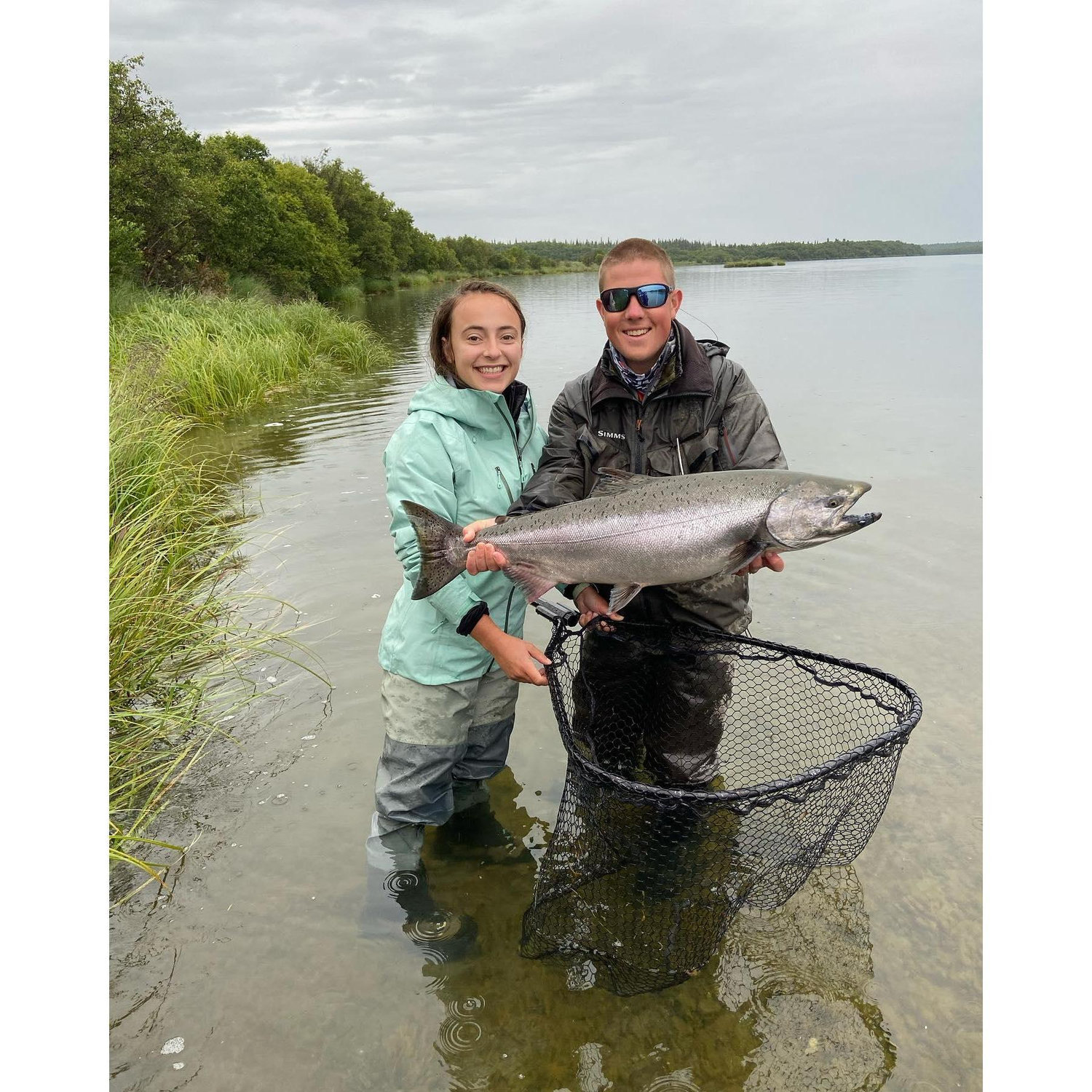 In Alaksa, on the river that Carson guided, Kaylee caught her first king Salmon weighing in at 22lbs.