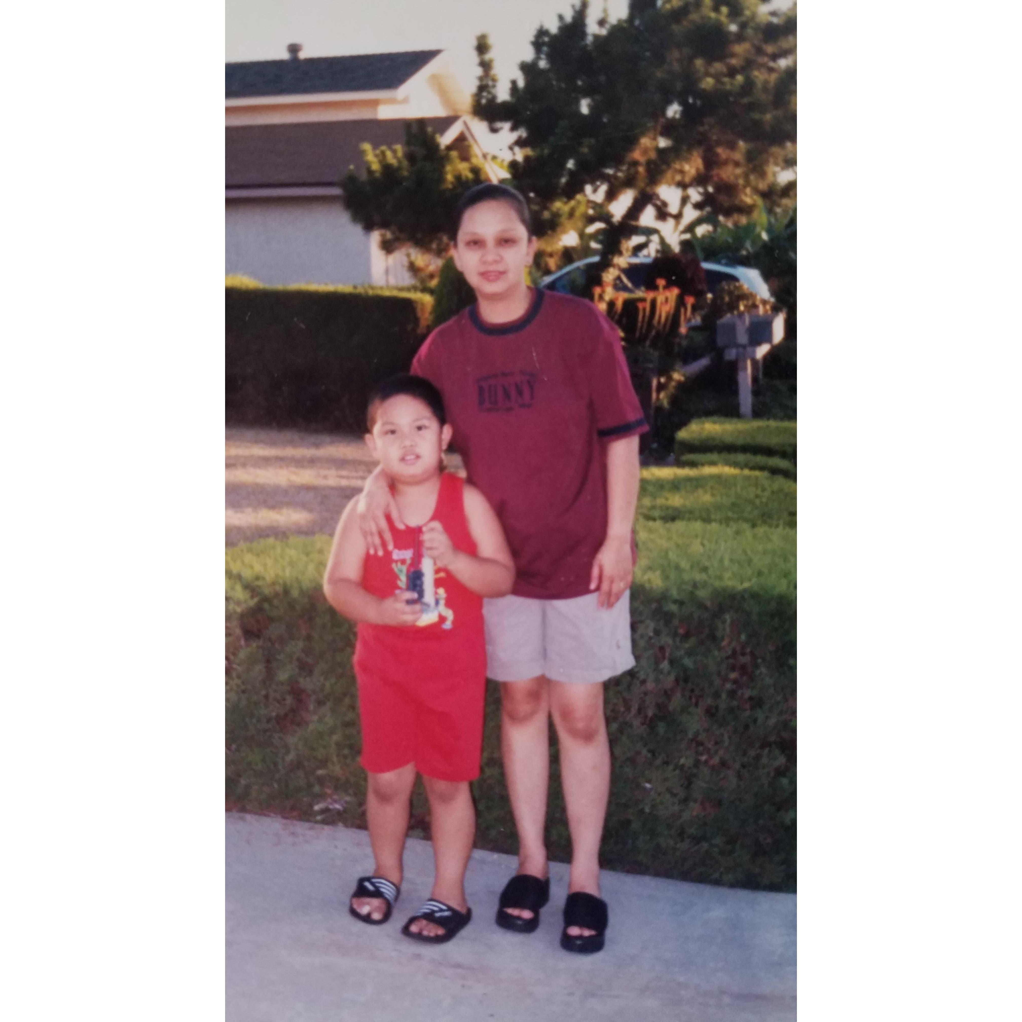 Jan and his mom, Criselda, when they first moved to their current house in 1997