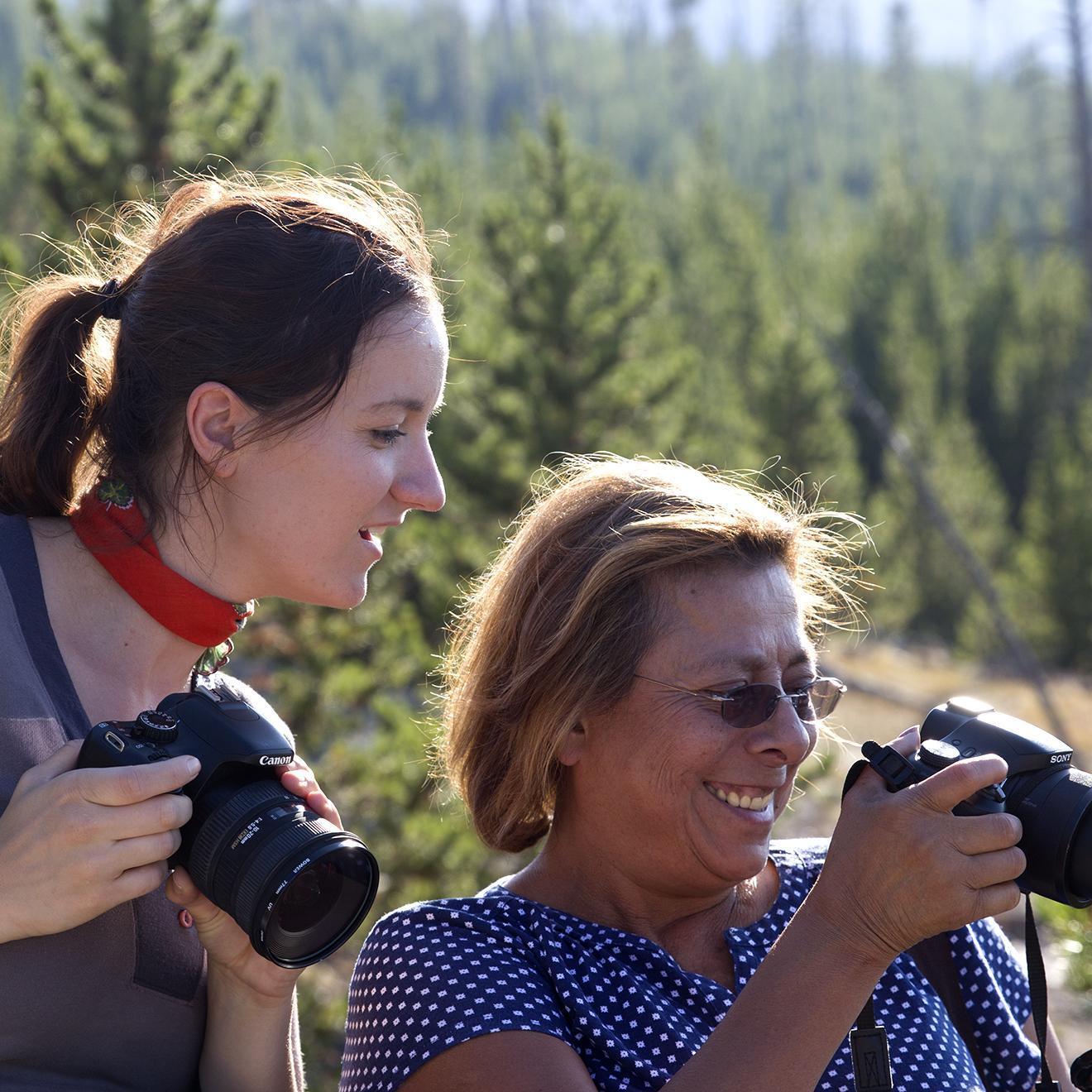 Ladies competing for the best photo of Yellowstone NP.
