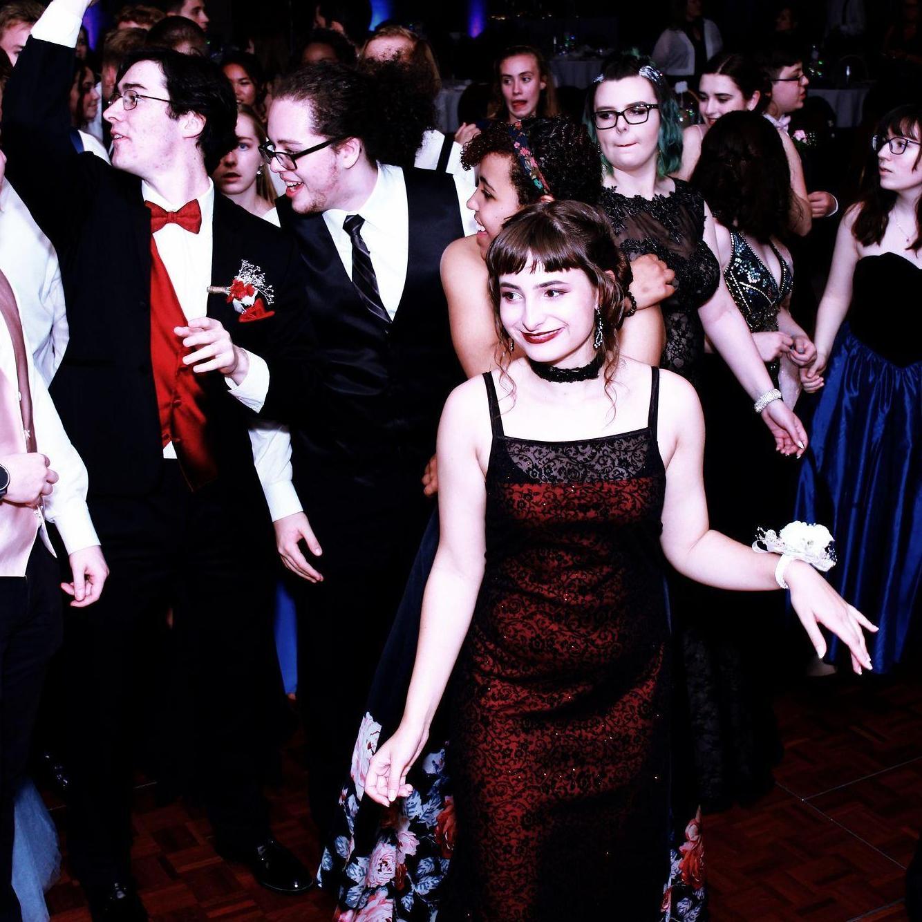 Syd strutting around during senior prom, 2018