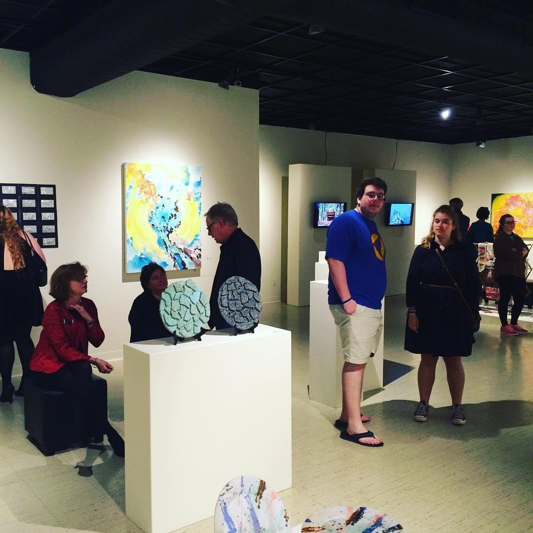 Caught mingling at the Juried Student Art Exhibit. Aaron and Claire each had pieces selected for the show! May 2016