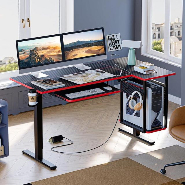 Bestier Standing Desk Adjustable Height, L Shaped Electric Stand Up Desk for Home Office, Sit Stand Desk with Keyboard Tray, Right Enclosed Host Shelf & Pegboard (Black 3D Carbon Fiber with Red Edge)