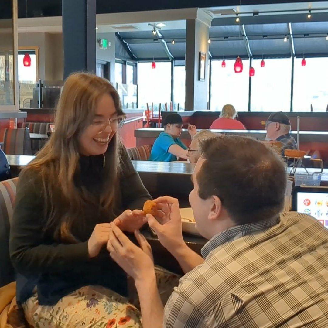 On Valentine's Day 2025, Ben proposed to Hannah with an onion ring at a Red Robin...