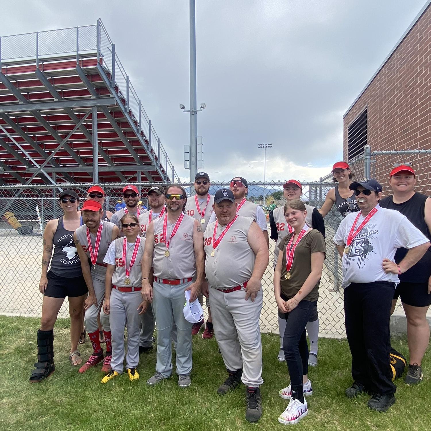 Winning the gold medal at Special Olympics softball! Kristan’s 10th year coaching and Jeremy’s 1st year playing!