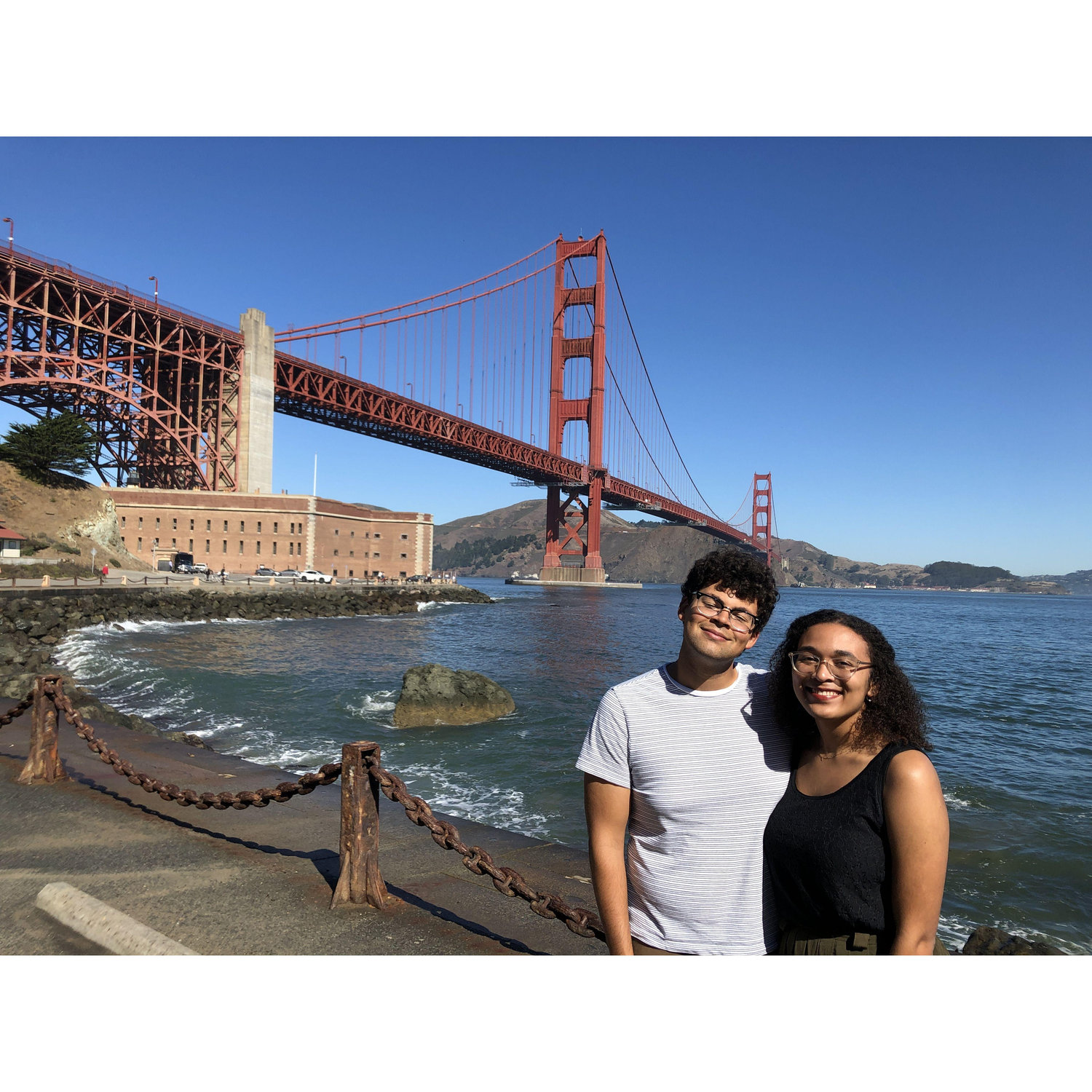 2019: In front of Fort Point National Historic Site and the Golden Gate Bridge. Vanessa has this photo printed out and hanging on her wall.