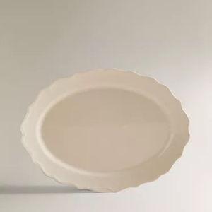 EARTHENWARE SERVING DISH WITH RAISED-DESIGN EDGE