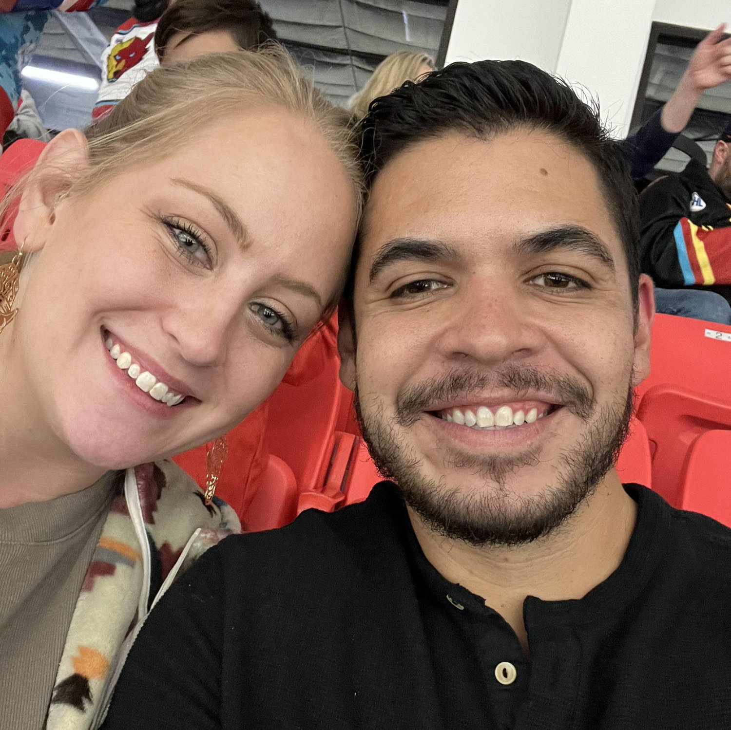 At a New Mexico Ice Wolves Hockey Game in 2023, the night that Ryan first said "I love you."