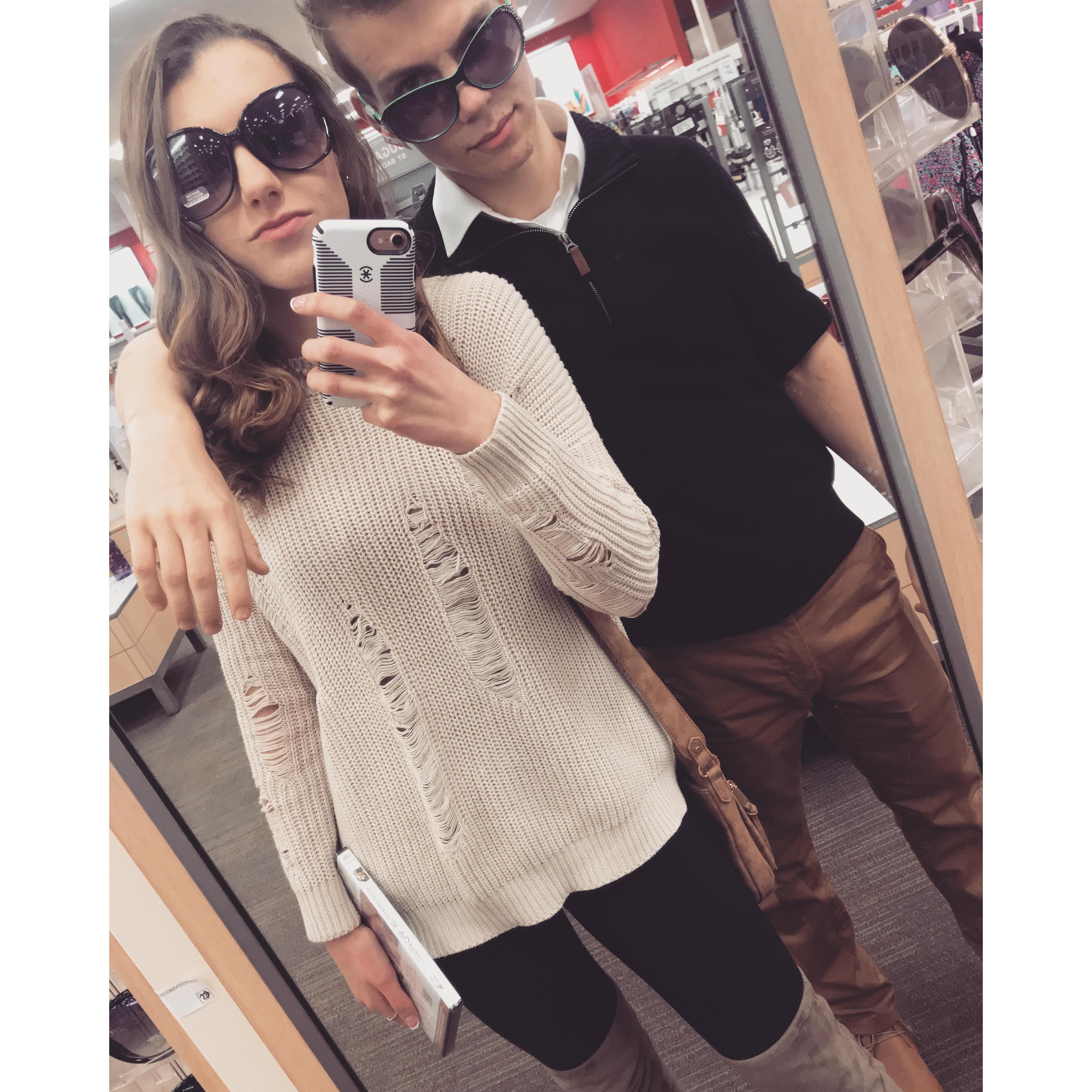 Trying out different sunglasses at Target