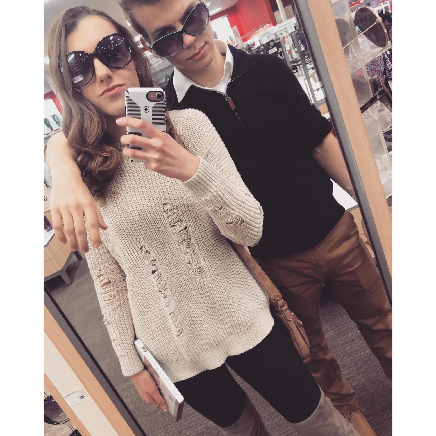 Trying out different sunglasses at Target