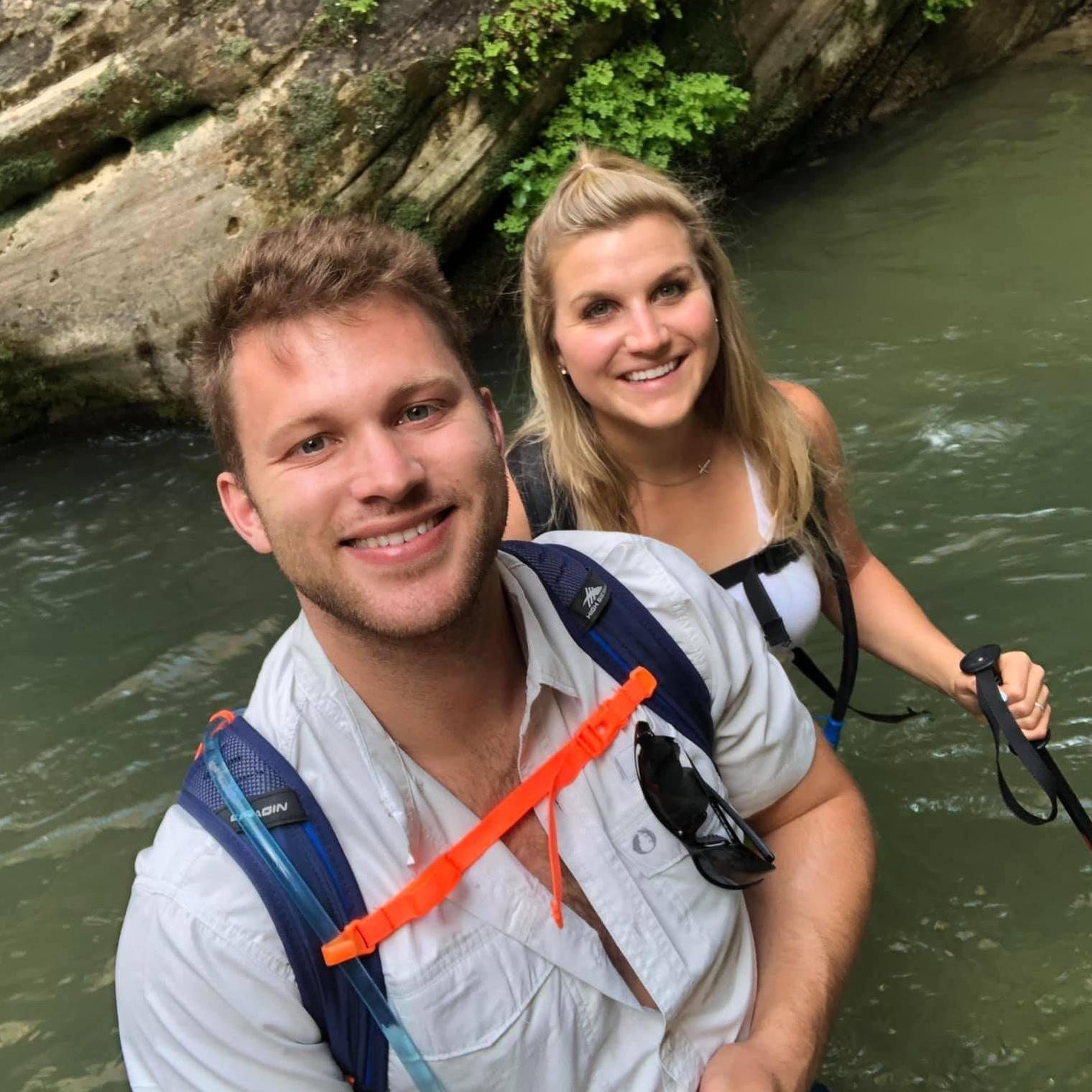 Kaley & Michael hiking "The Narrows" at Zion National Park. This is the same road trip where they got engaged!