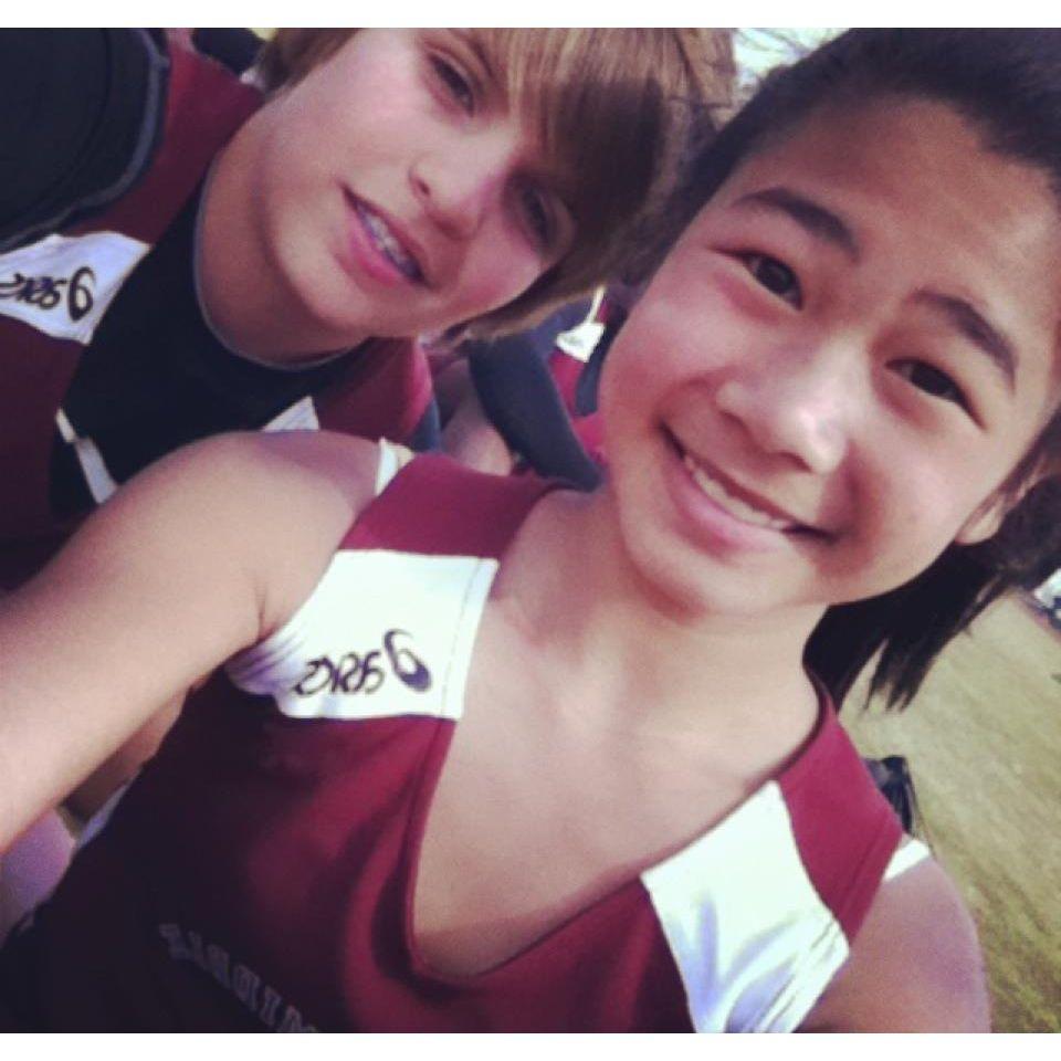 Our first picture together, ever. Track Buddies! "White Bro & Azn Sis"