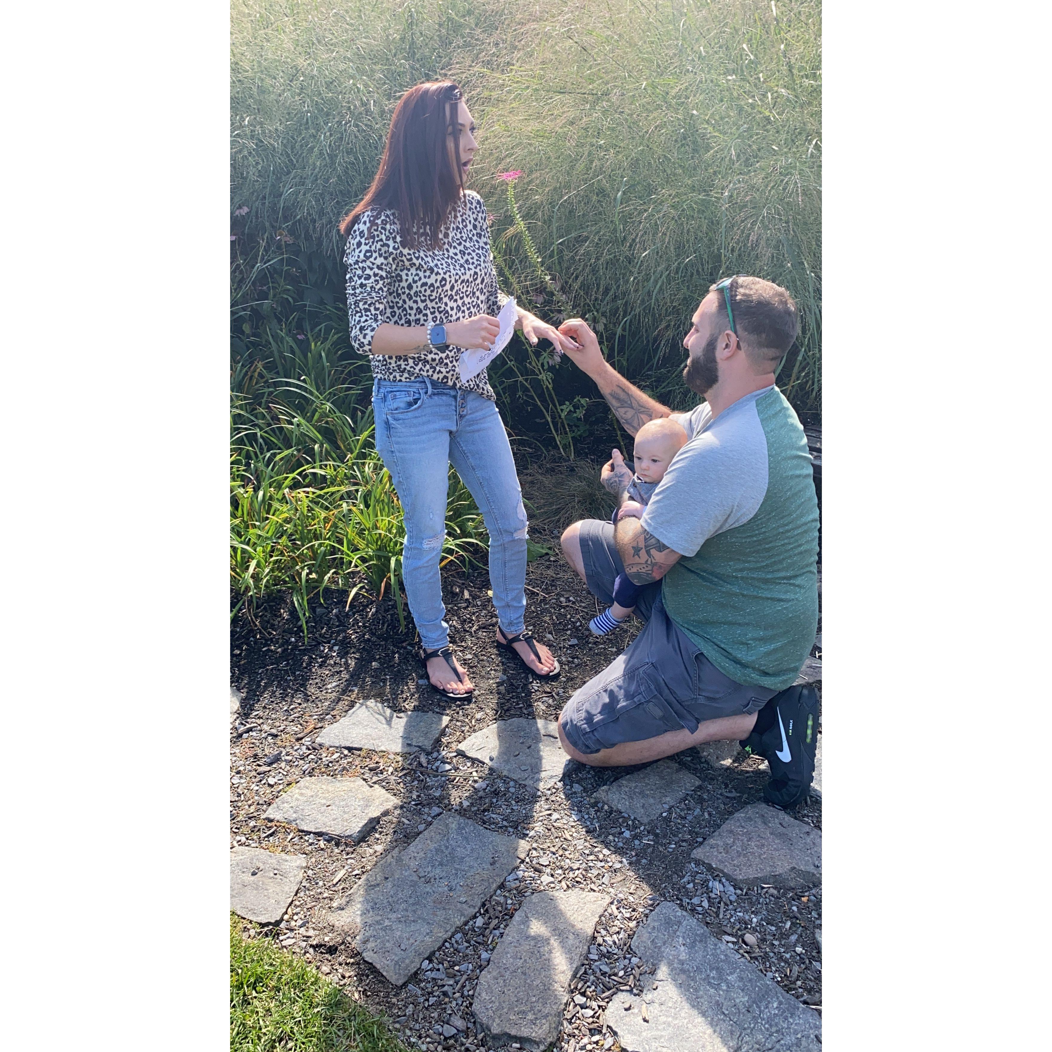 With our- 3 month old son right there with us he got down on one knee and asked me to marry him- making it one of the most special moments in our lives.