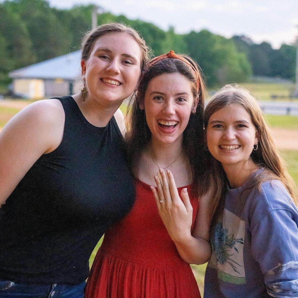 Abigail Byrd and Sarah Creel, who helped set up the engagement picnic