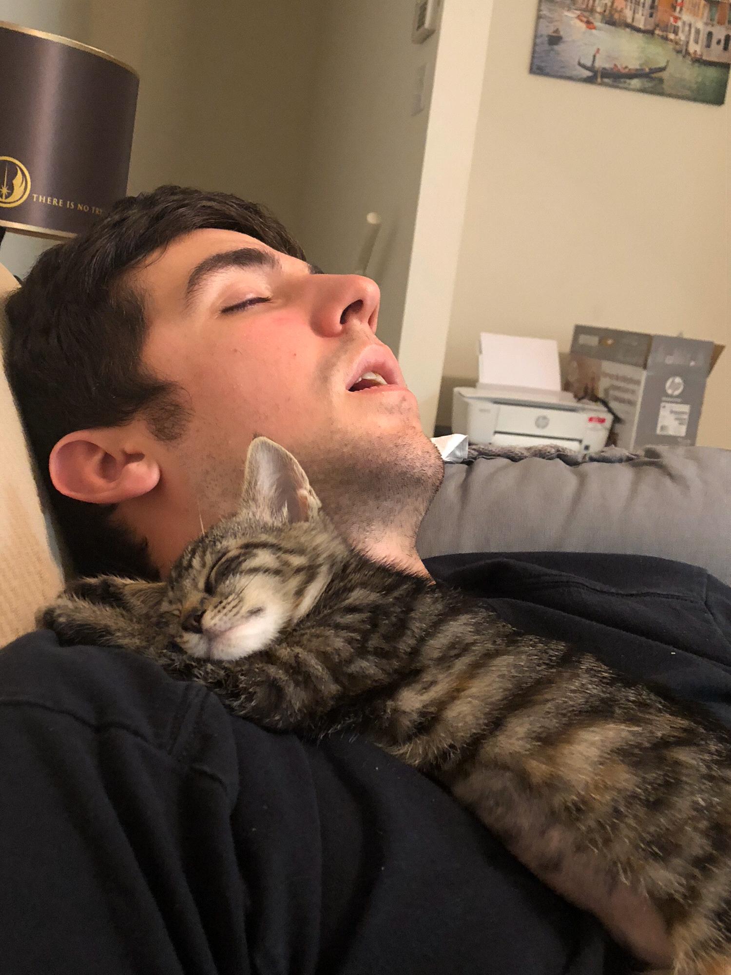 Dave and our cat, Cleopatra, on the day we brought her home from the shelter. Dave and Cleo bonded from day one!
