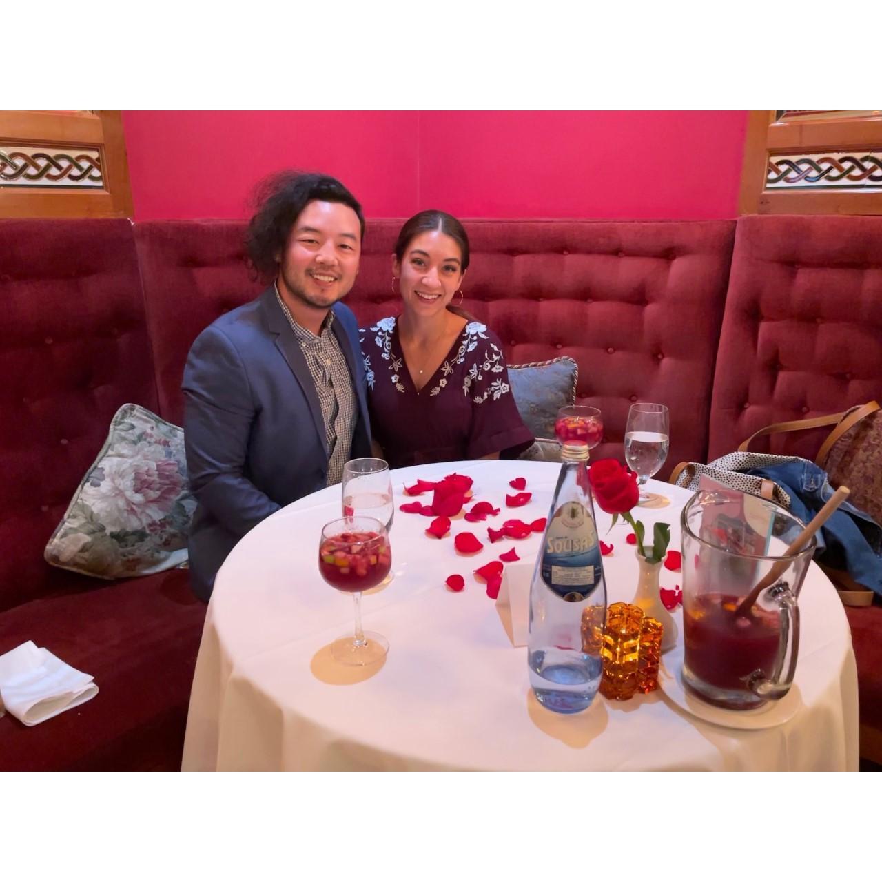 Celebrating one year engaged-rose petals and all.