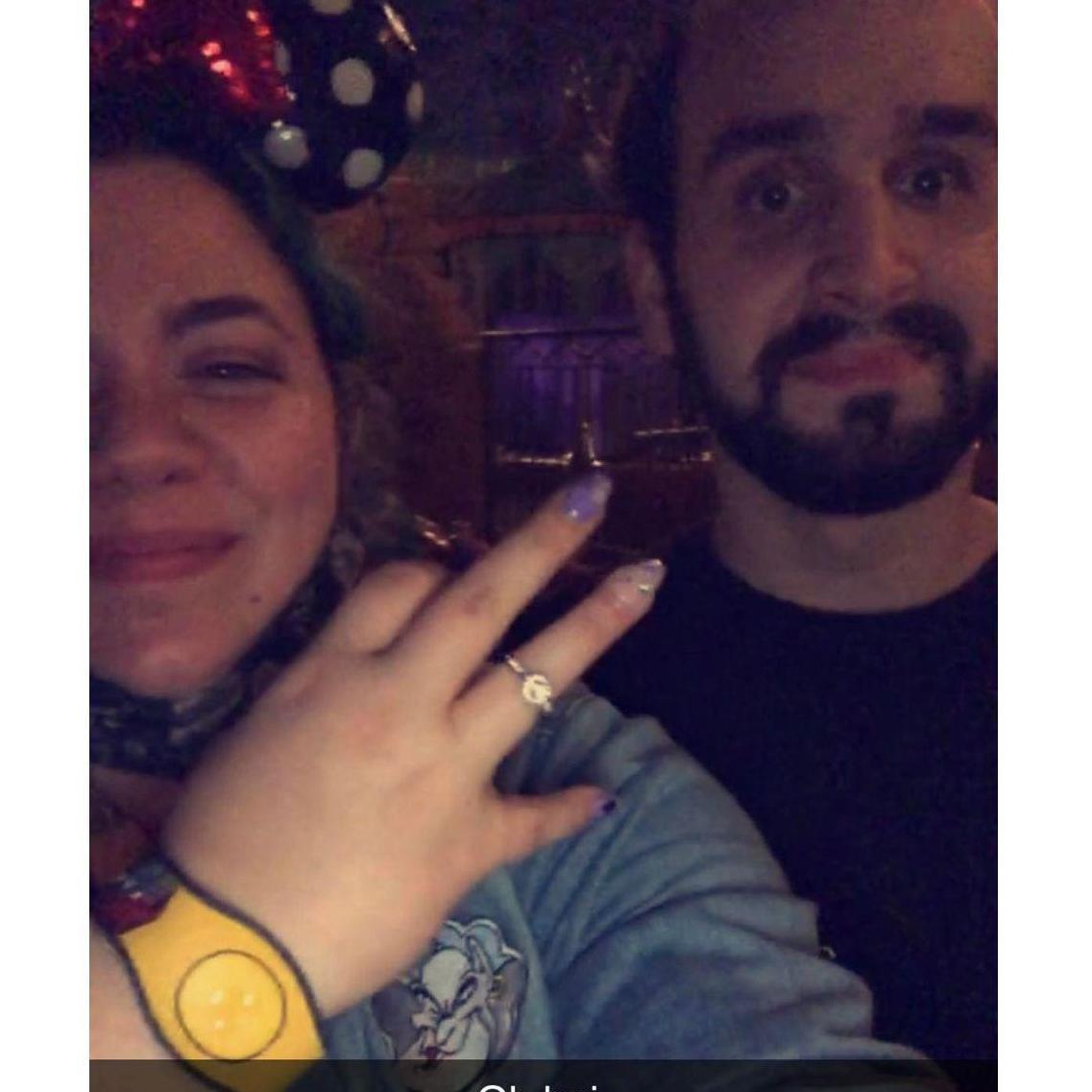 Holden Proposed while getting on The magic carpet ride at Disney World. Oliver was given the job of photographer which is why this is the only pic we have of it. 