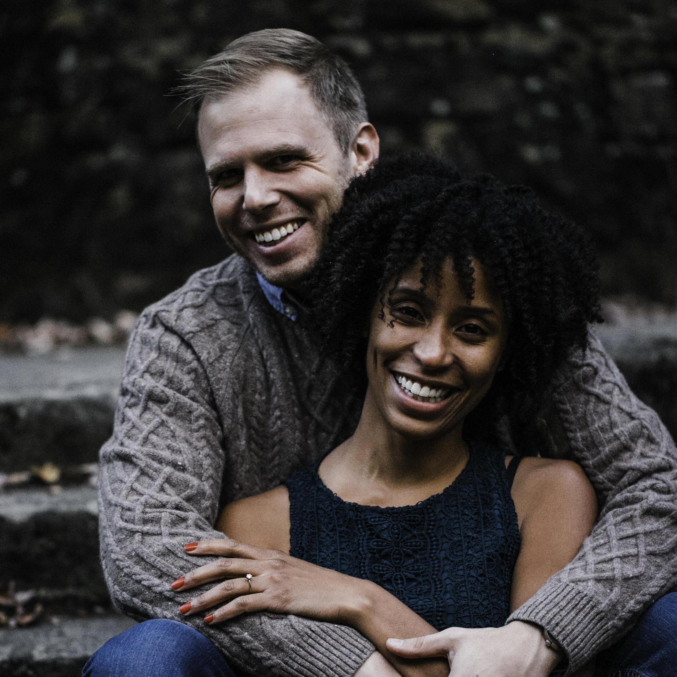 Engagement photos. The smiles on our faces are because of the photog's dog doing zoomies around us!