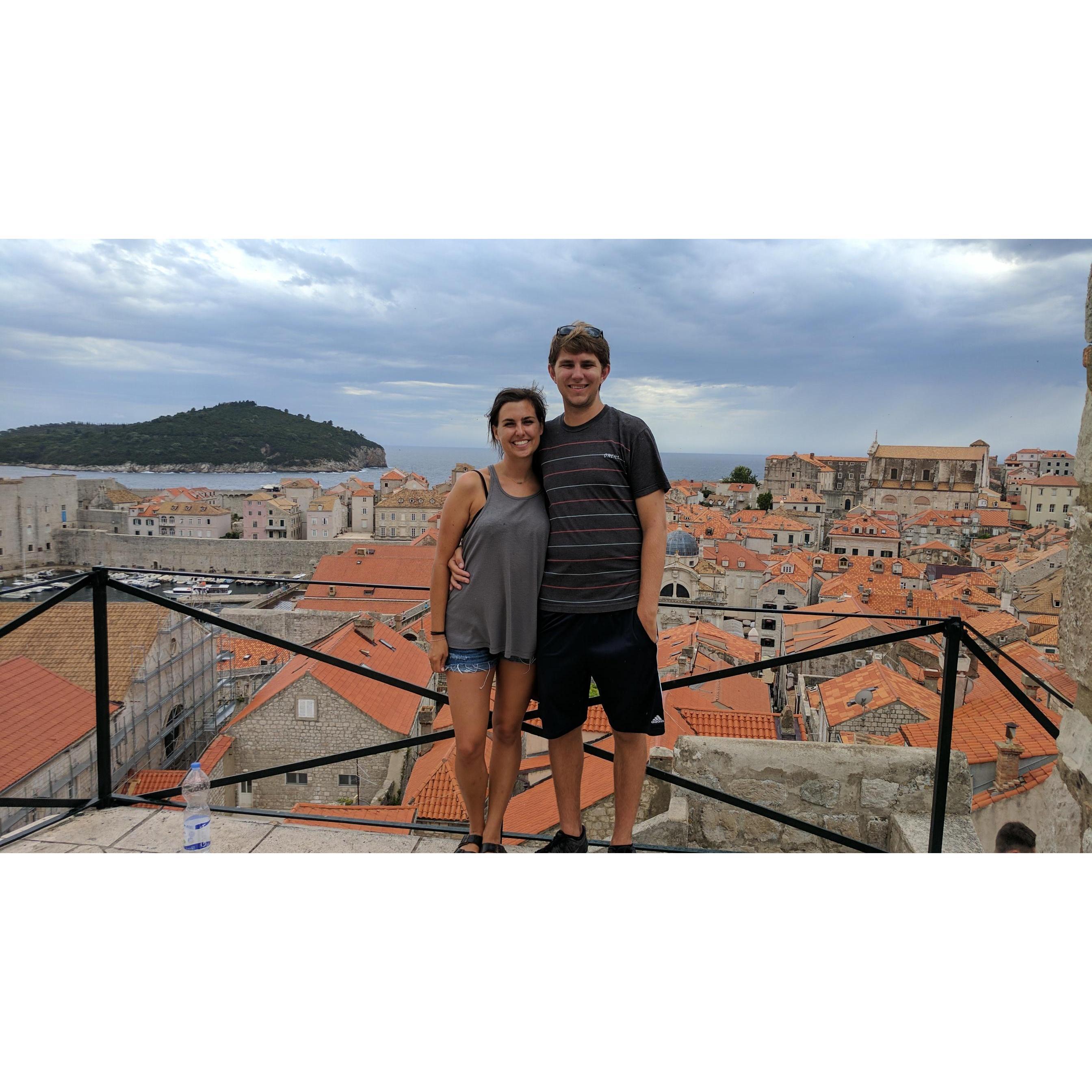 Another pic from our post-graduation travels. This one is on the city walls of Dubrovnik, Croatia. It started pouring rain right after the photo and so we ran around the streets laughing in the rain.