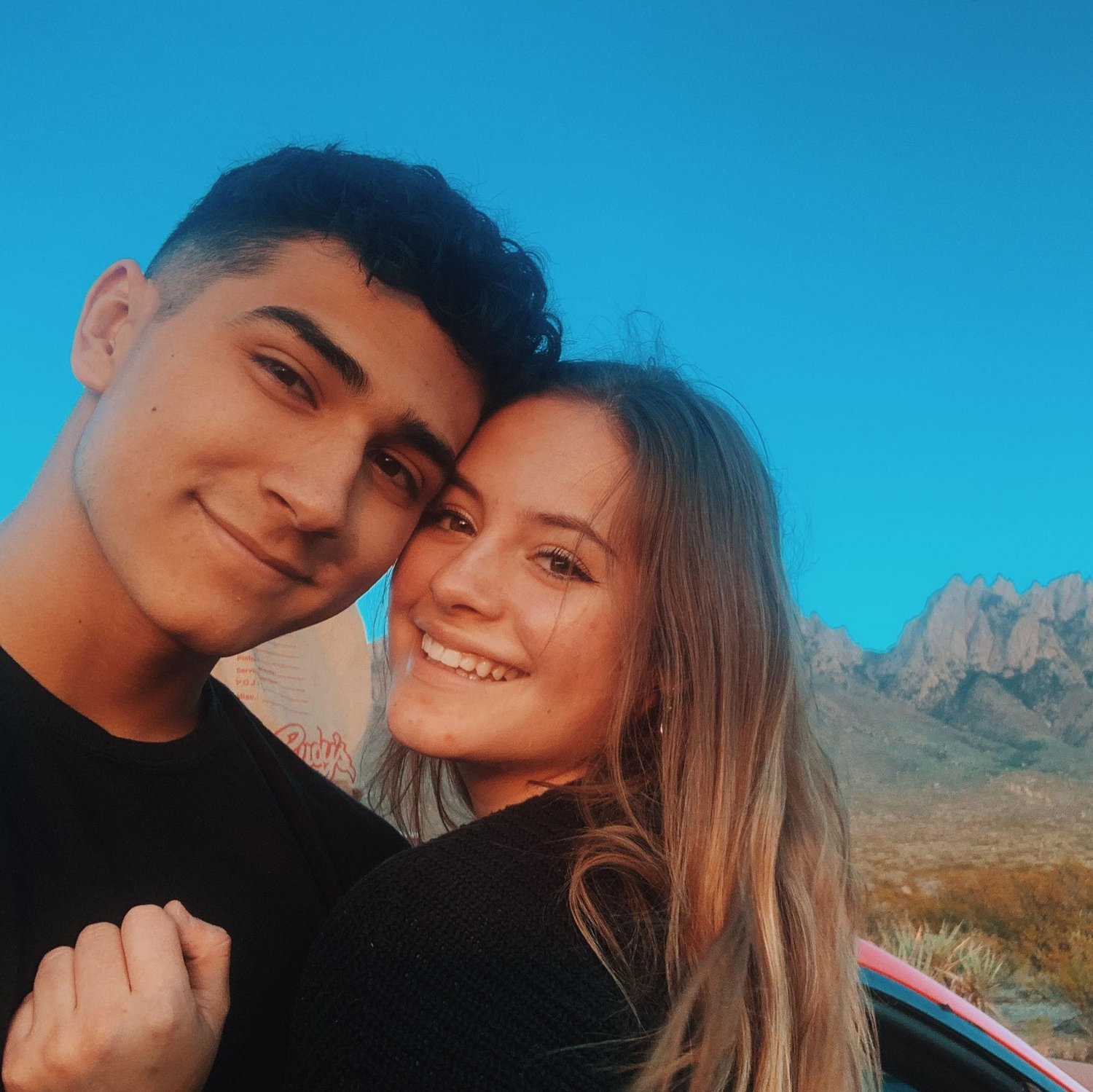 Jacob and Lexi on one at one of their favorite picnic spots: the Organ Mountains in Las Cruces :)
