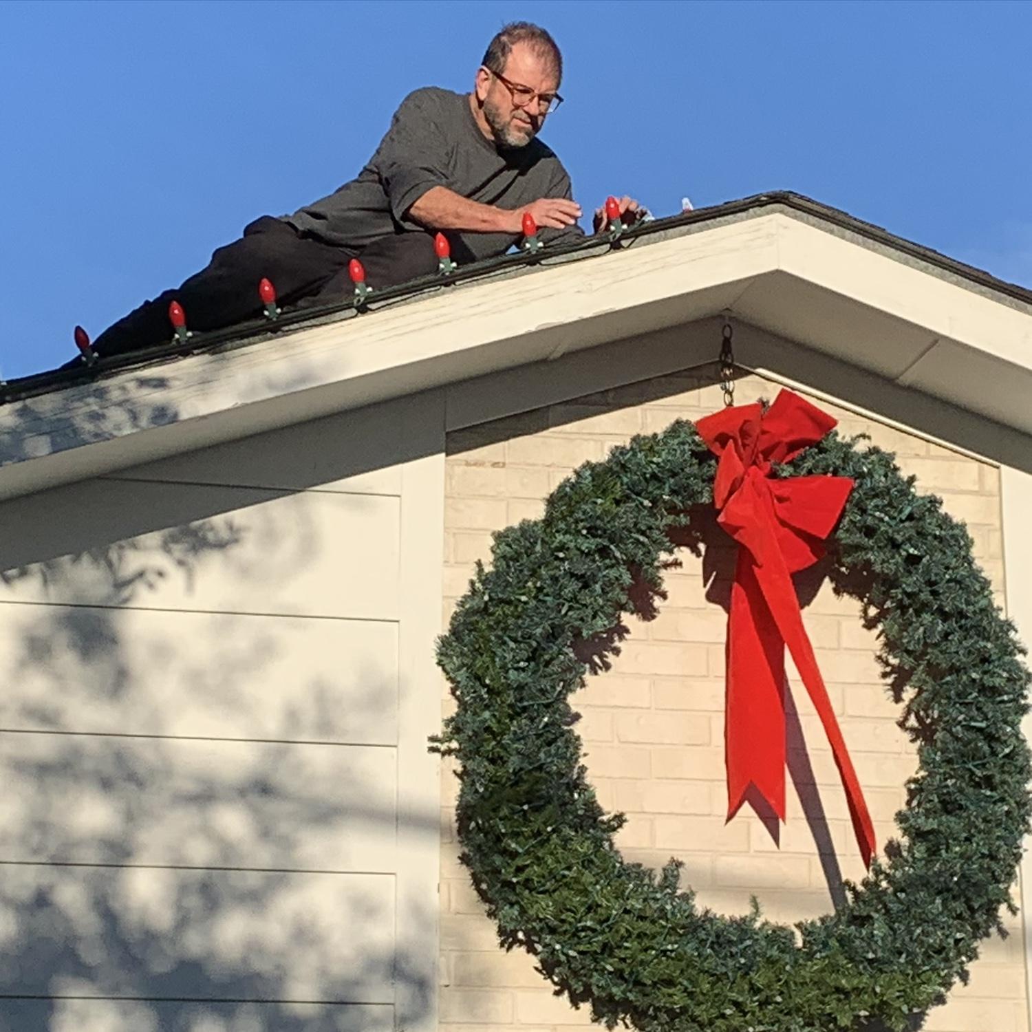 Mr Christmas on the roof of the duplex.