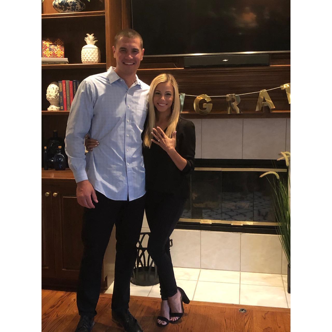 After Jonathan proposed, he surprised Julie with all their family and friend's at his parents house!