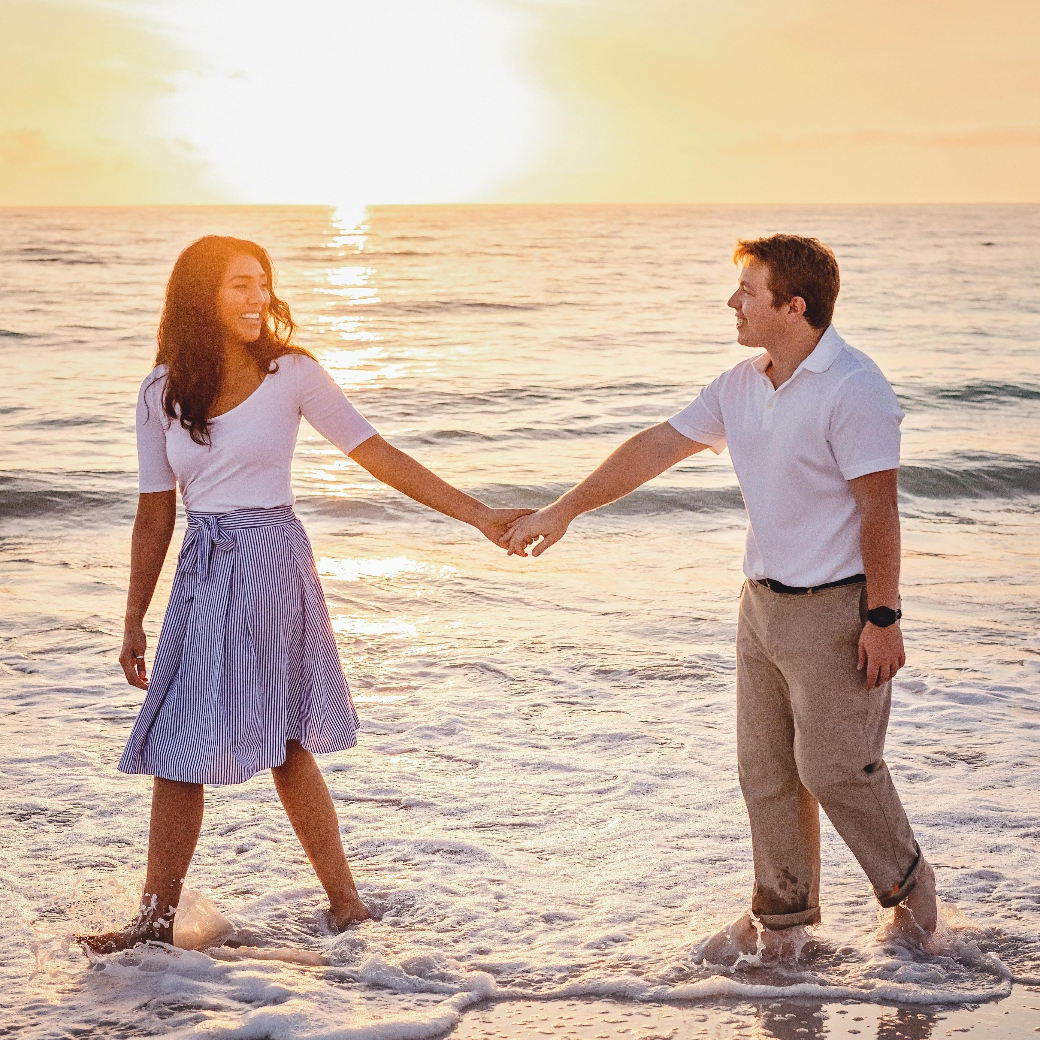 Strolling on the beach that Dan proposed on.