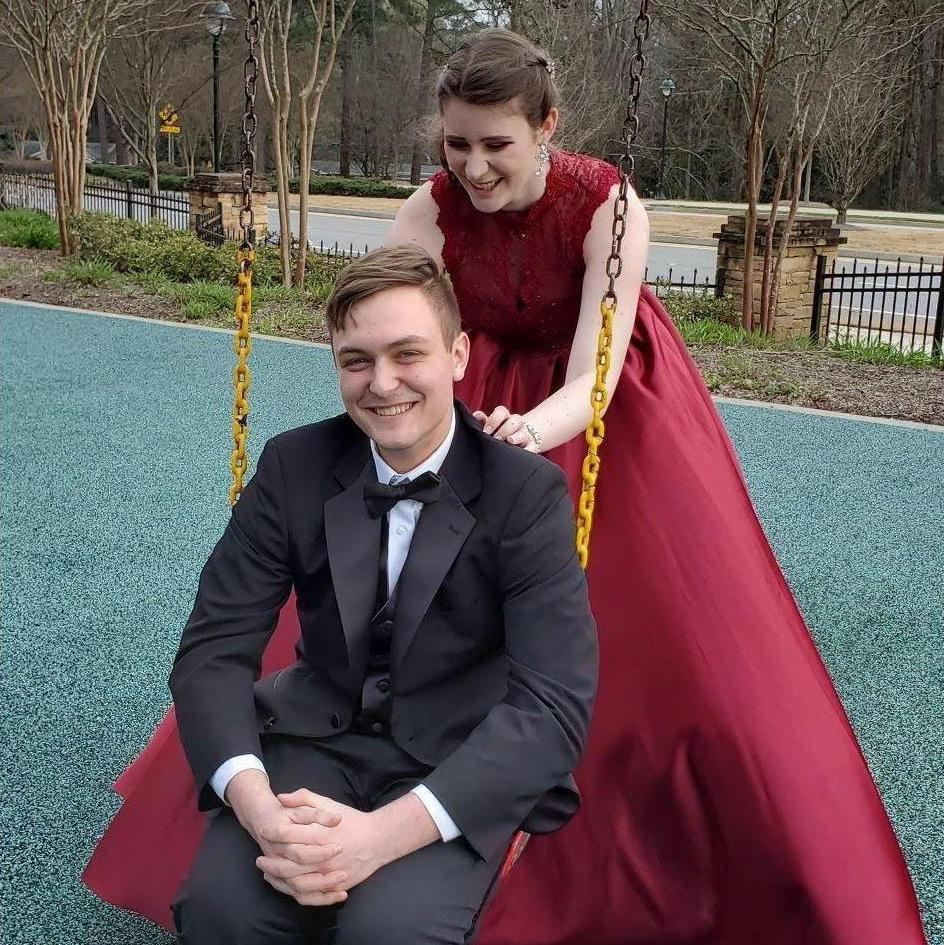 March 2020: My favorite photo from our canceled Prom photoshoot. Nolan being all handsome as I am being a gremlin behind him.