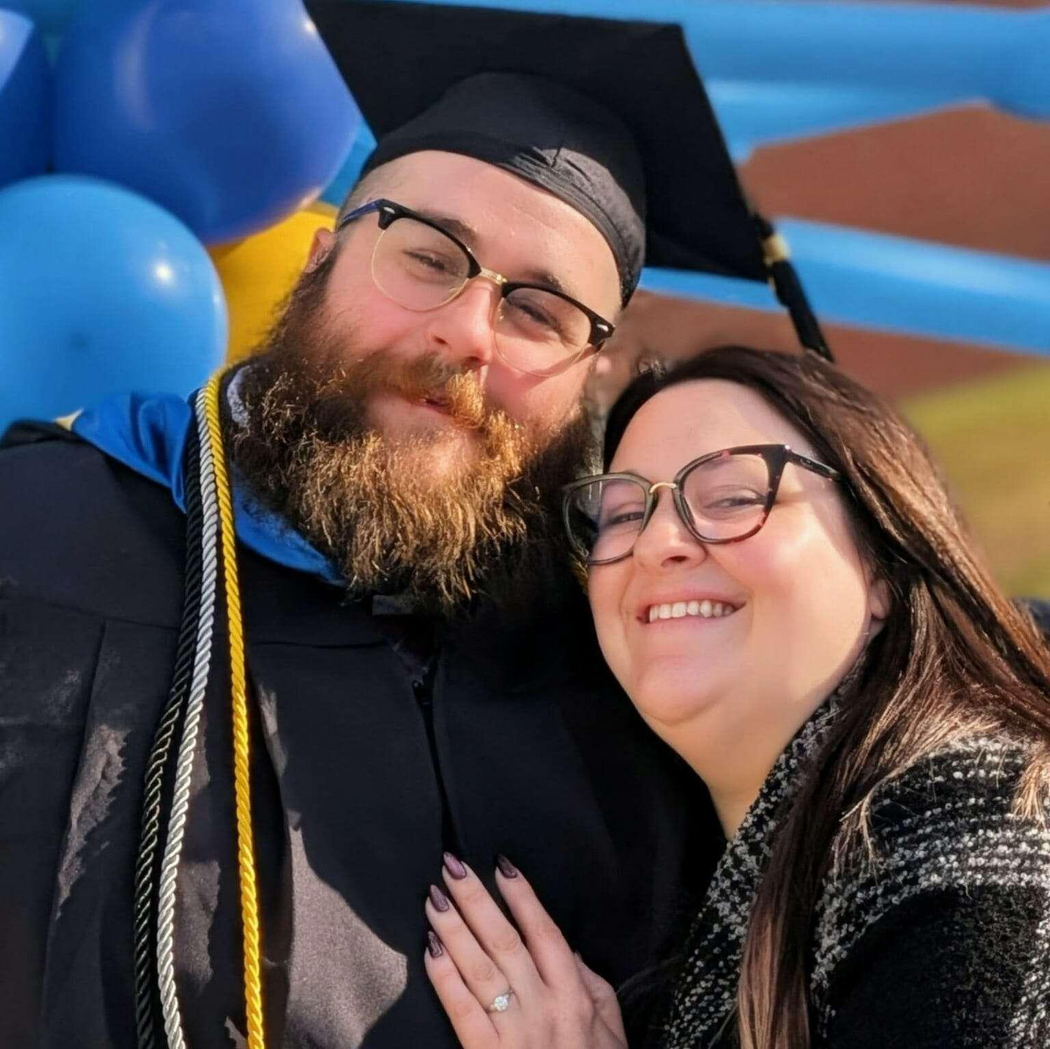 Getting my degree right after she said yes!