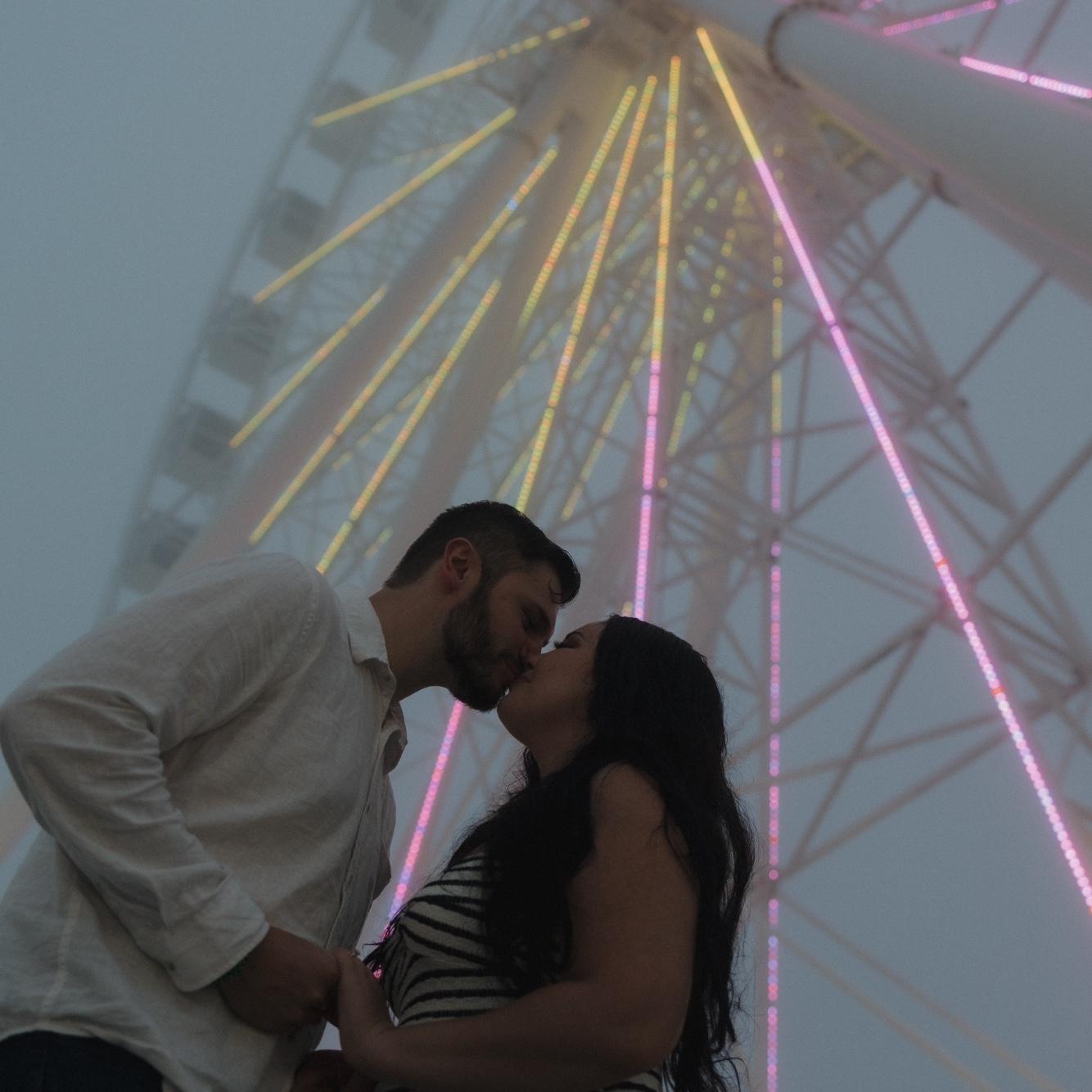Kiss by the Ferris wheel