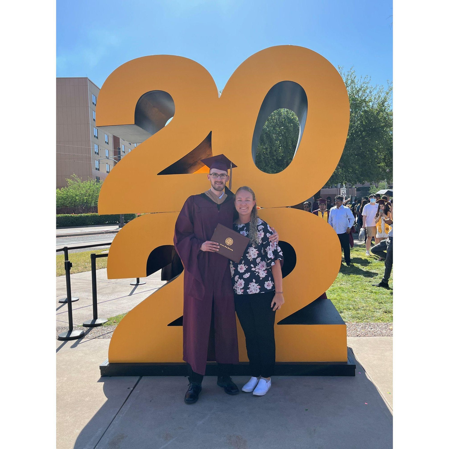 Trevor graduating with his Masters