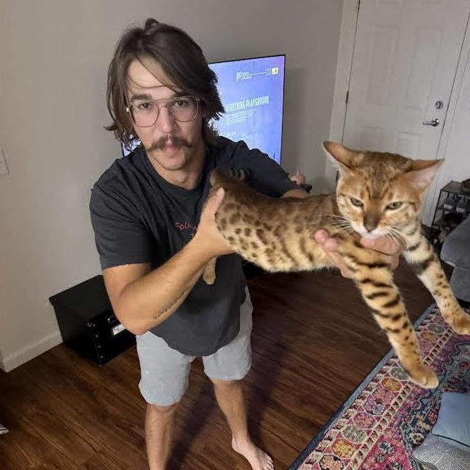 We adopted a kitty together! Louella is the BEST!