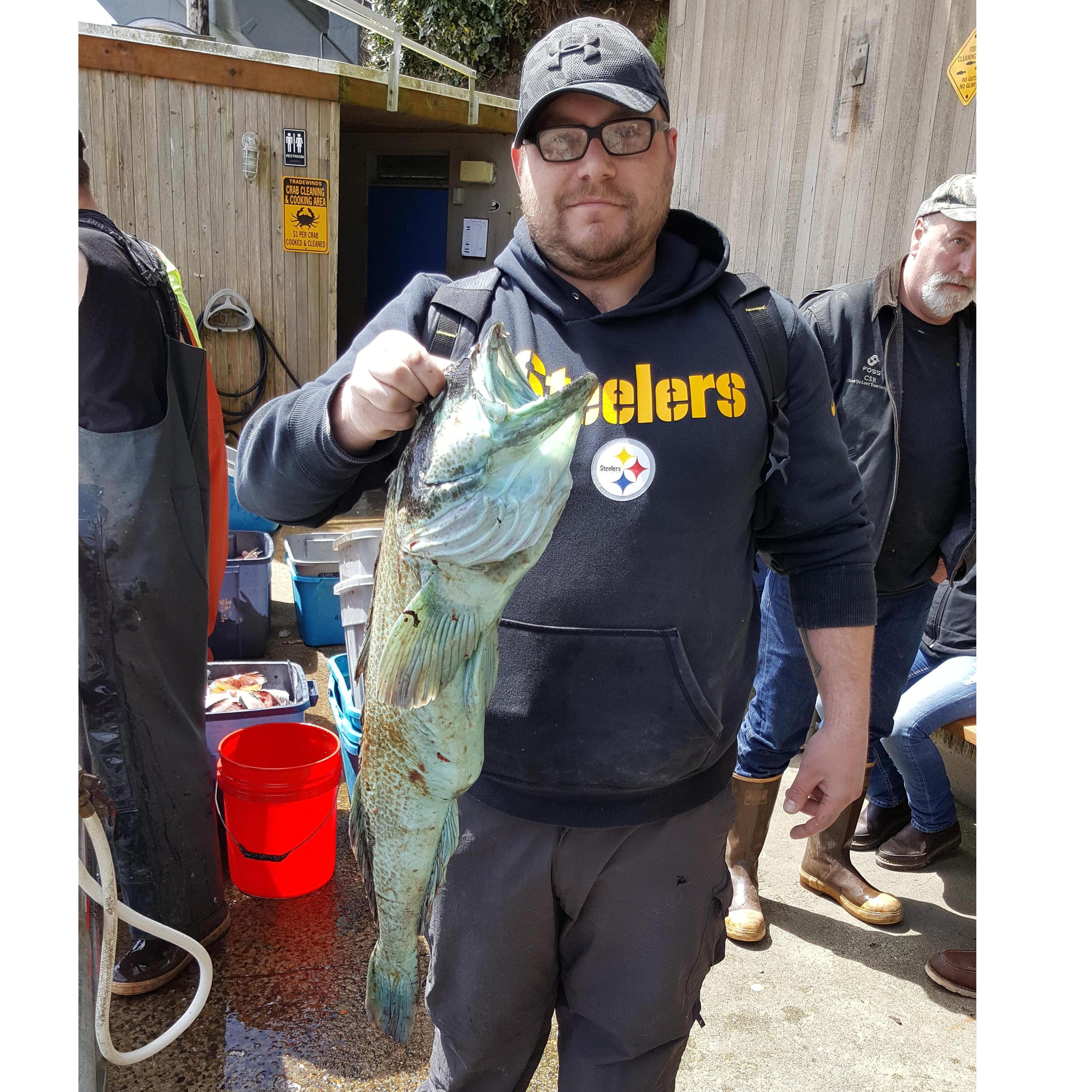 Adam and his prized birthday fish that he caught with a net!